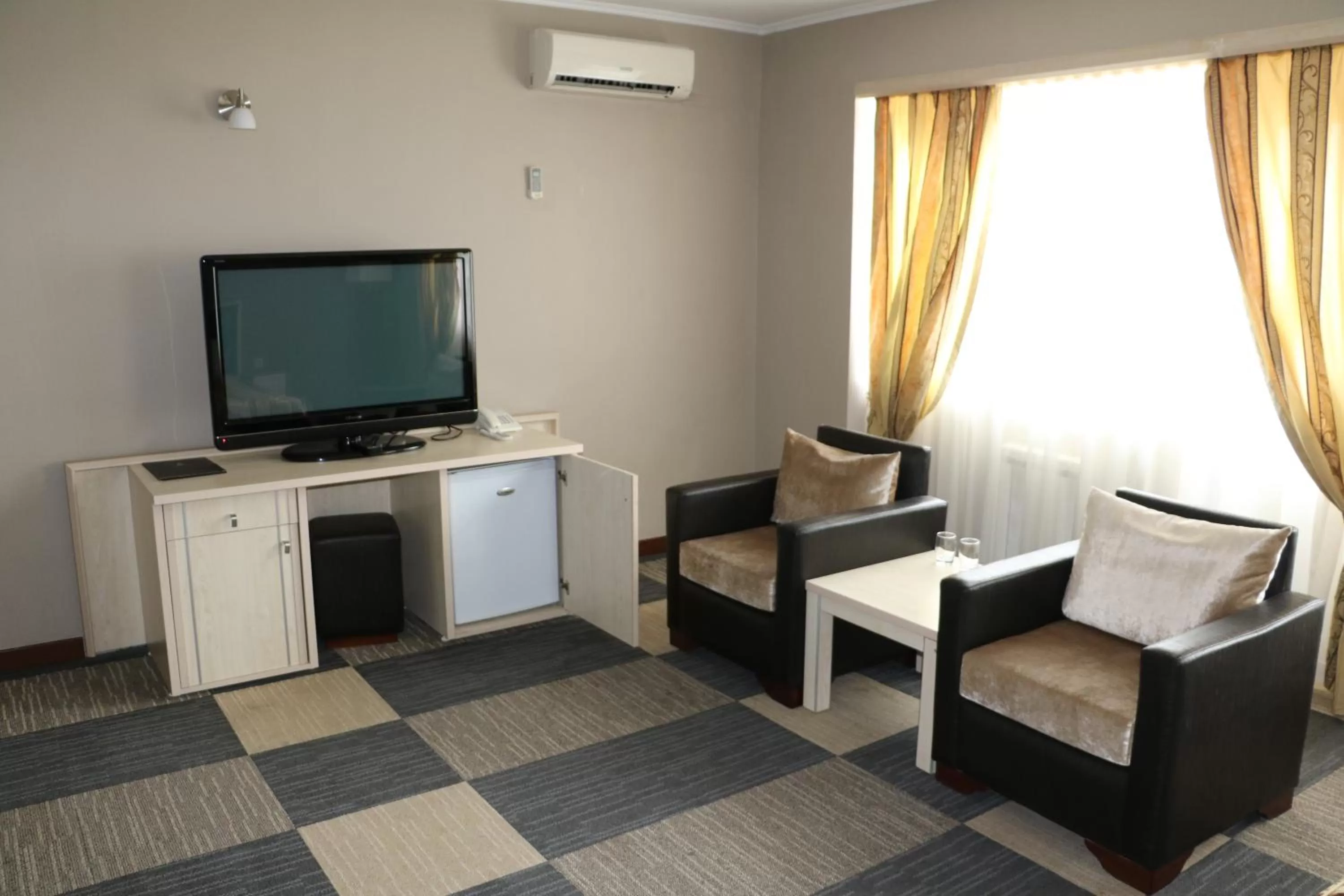 TV and multimedia, TV/Entertainment Center in Aktau Hotel