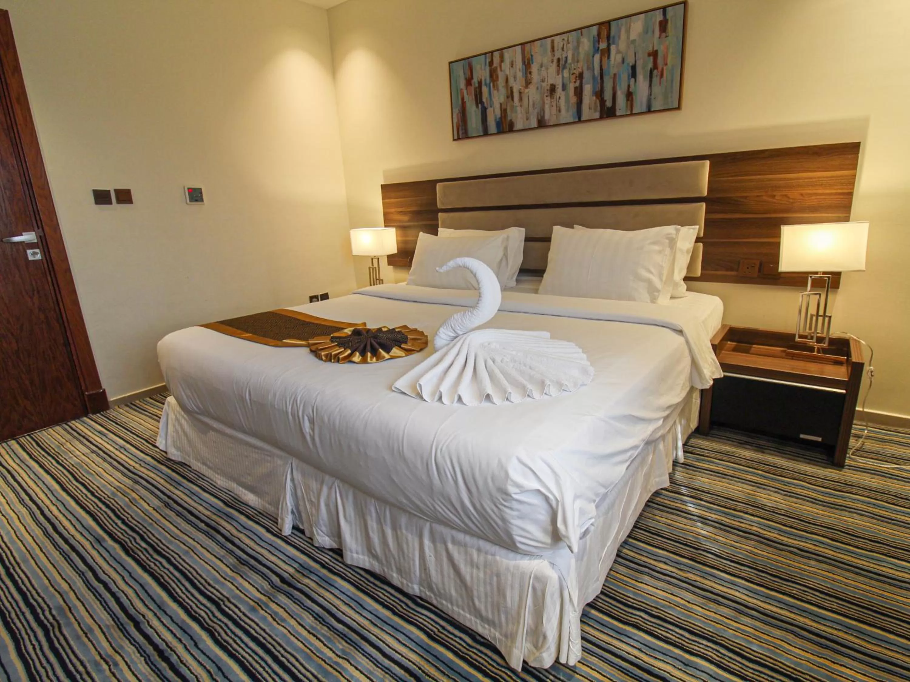 Bed in Friesian Hotel Suites