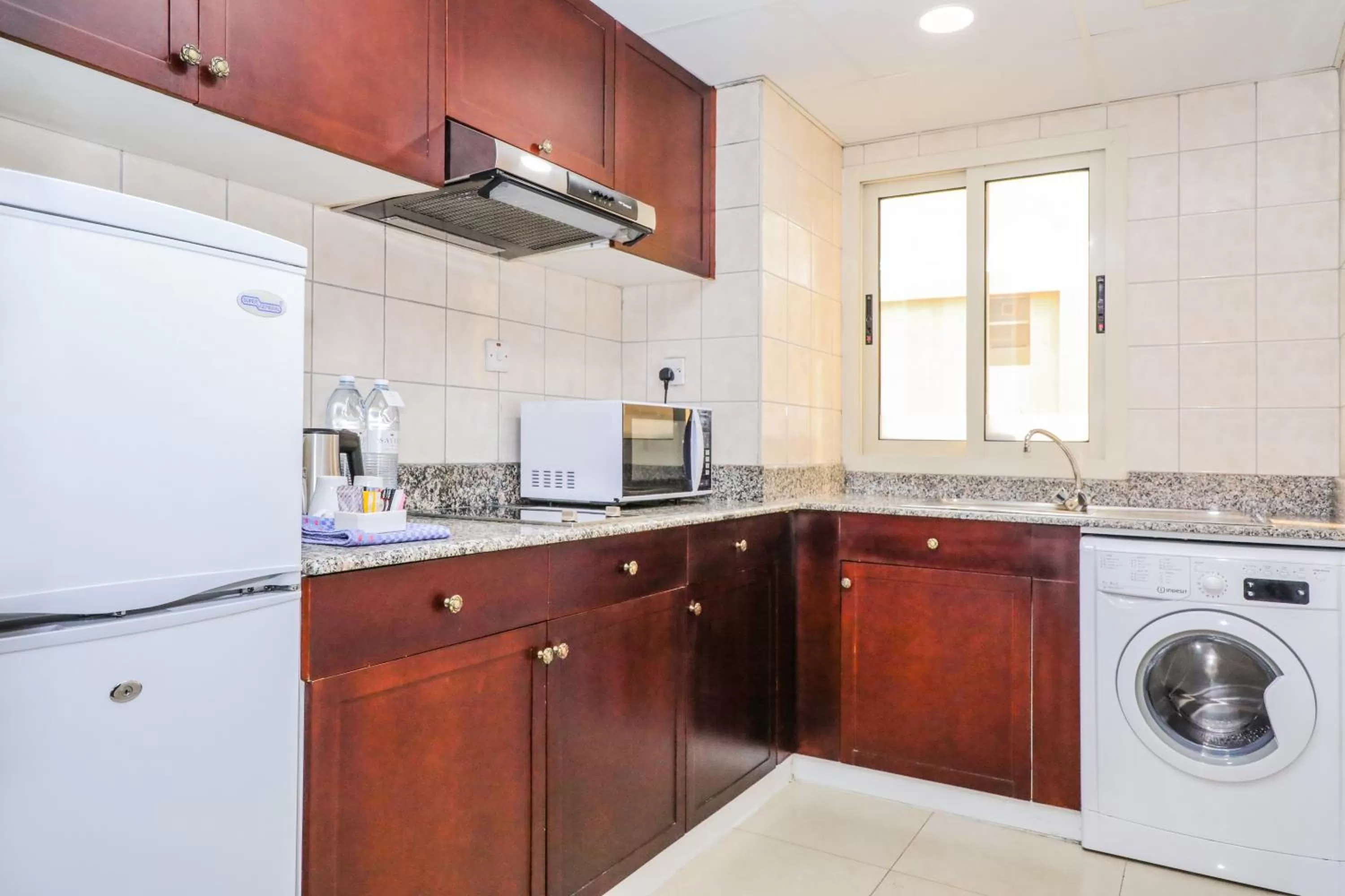 Kitchen or kitchenette in Savoy Crest Hotel Apartments
