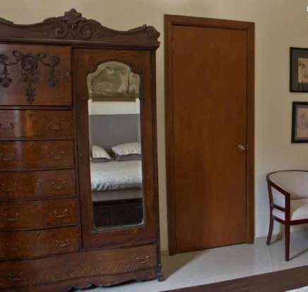 Seating area, Bed in Casa Madonna