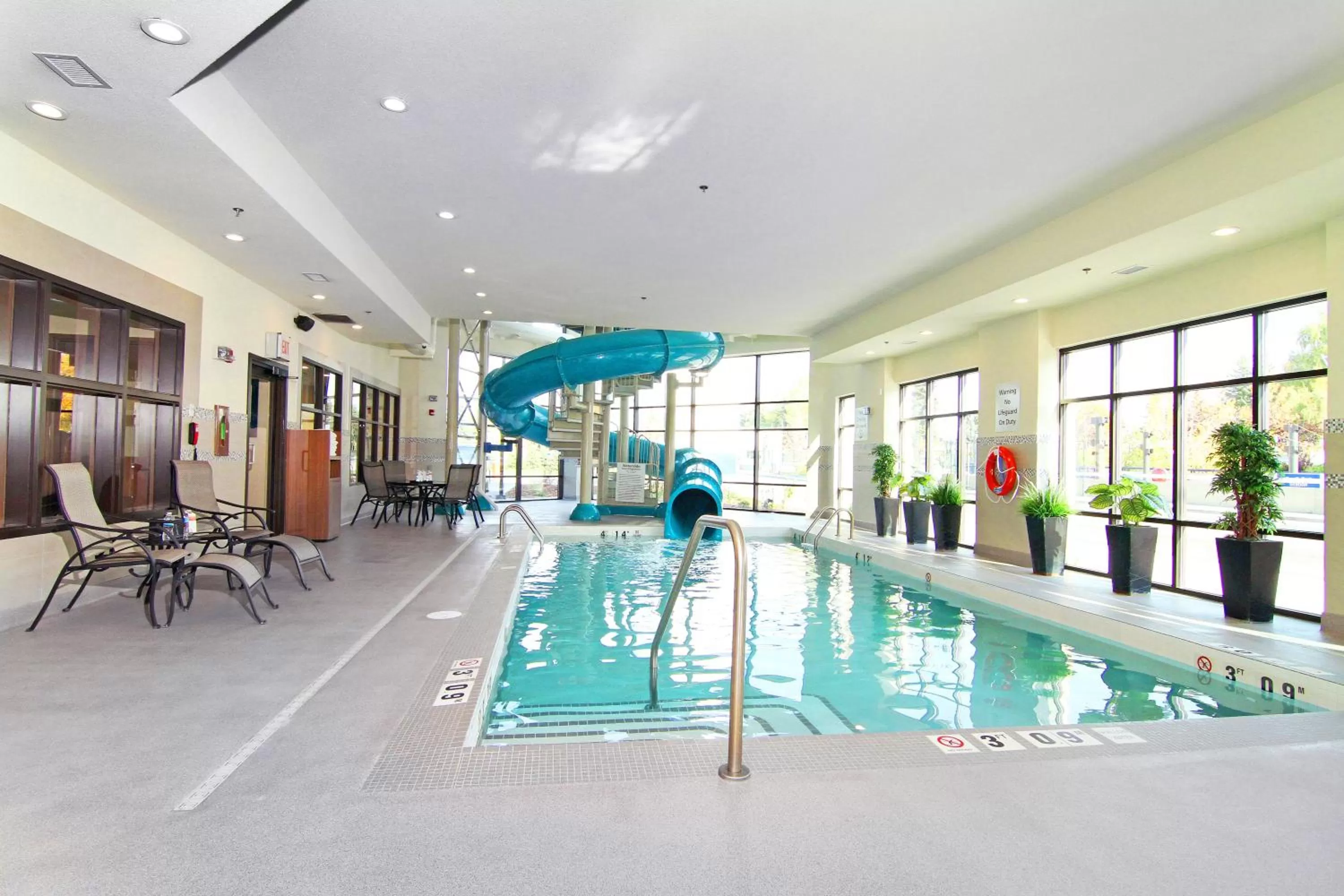 Swimming pool in Holiday Inn Express and Suites Calgary University by IHG