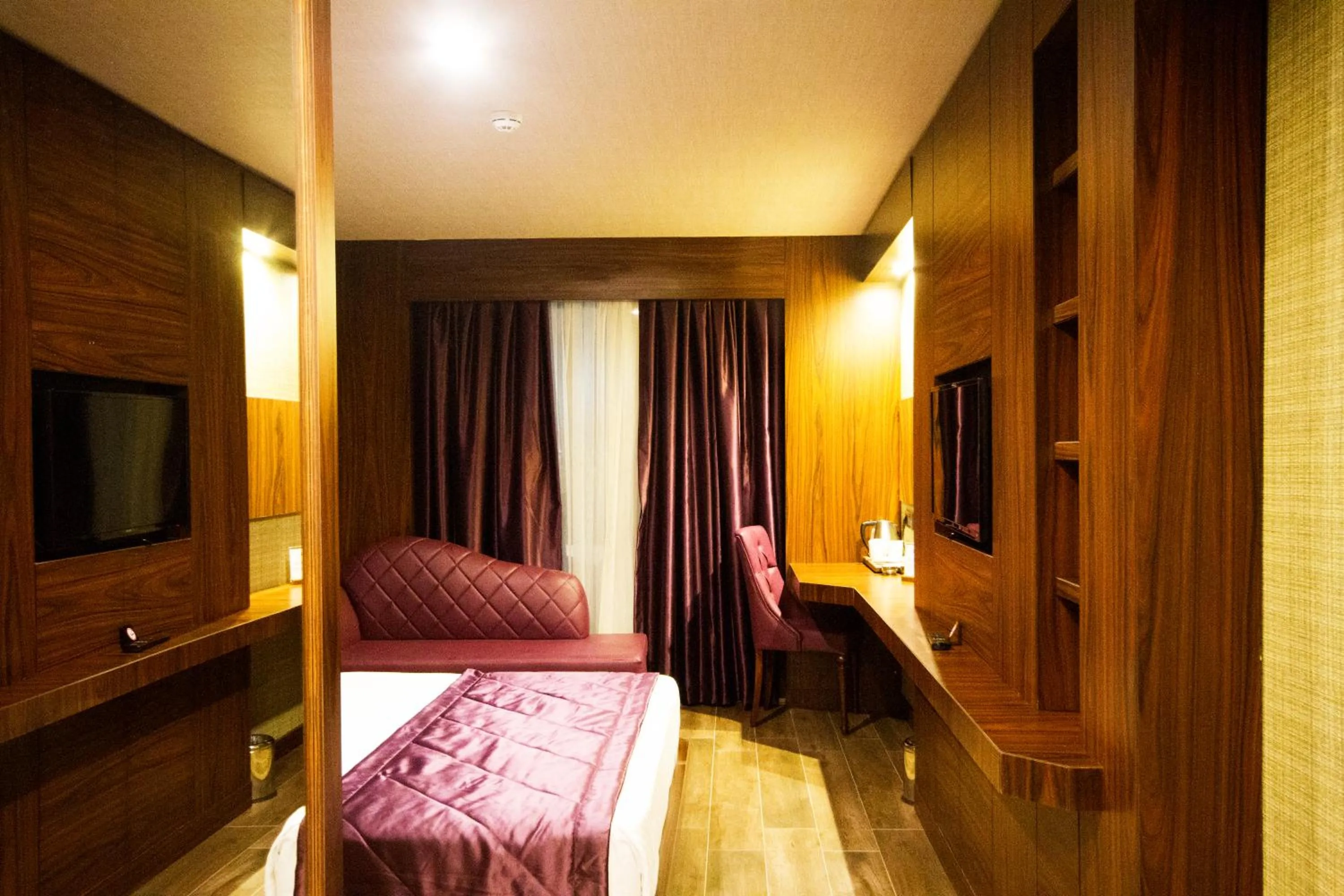 Photo of the whole room in SKY Business Hotel