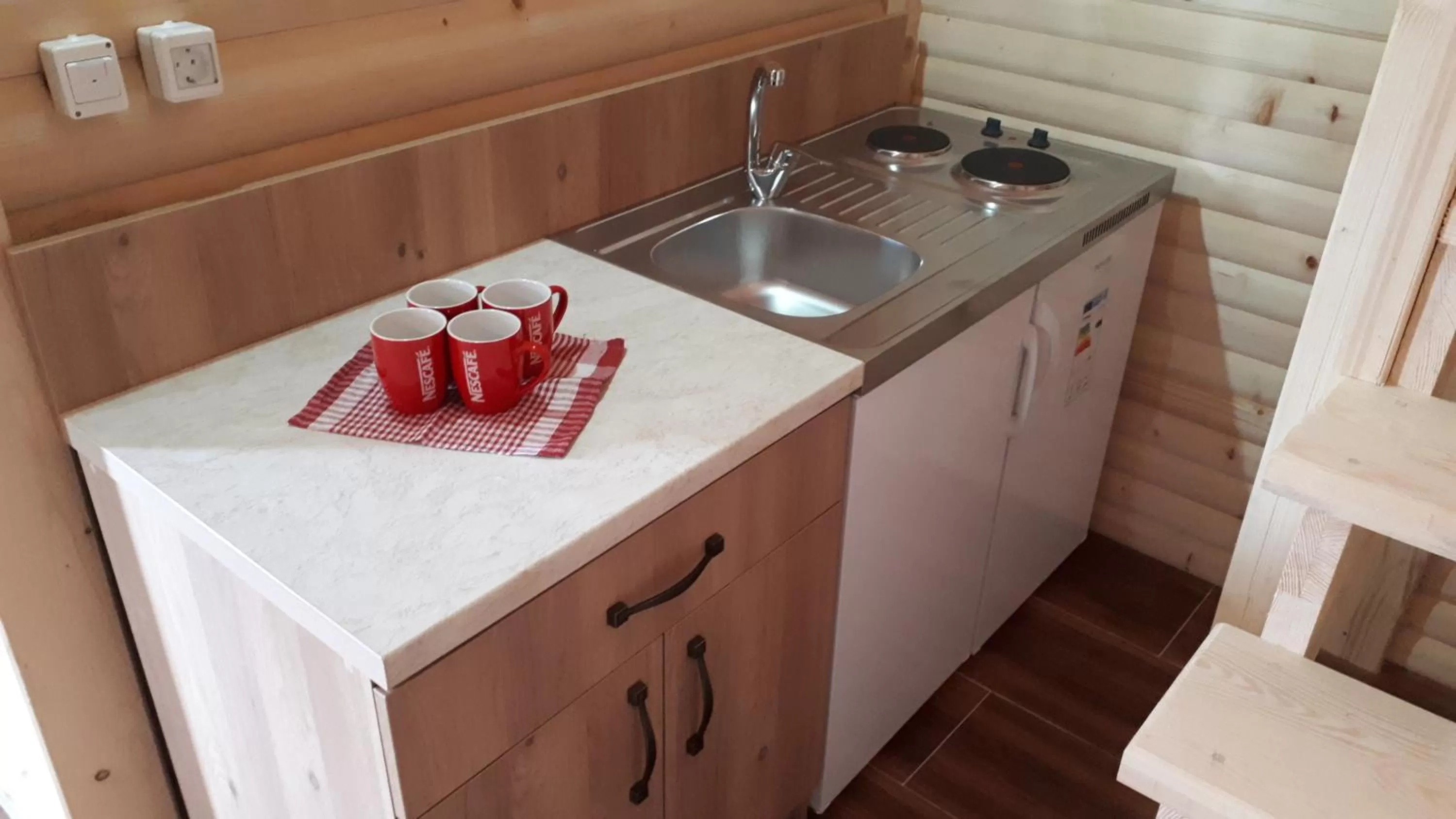 Living room, Kitchen/Kitchenette in Bed & Breakfast KUM