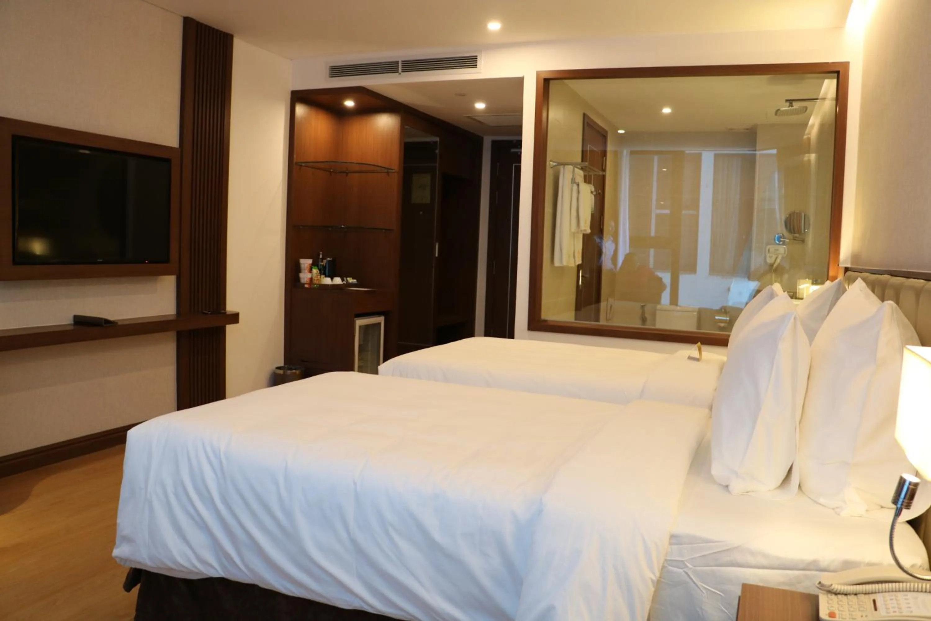 Bed in Regalia Gold Hotel