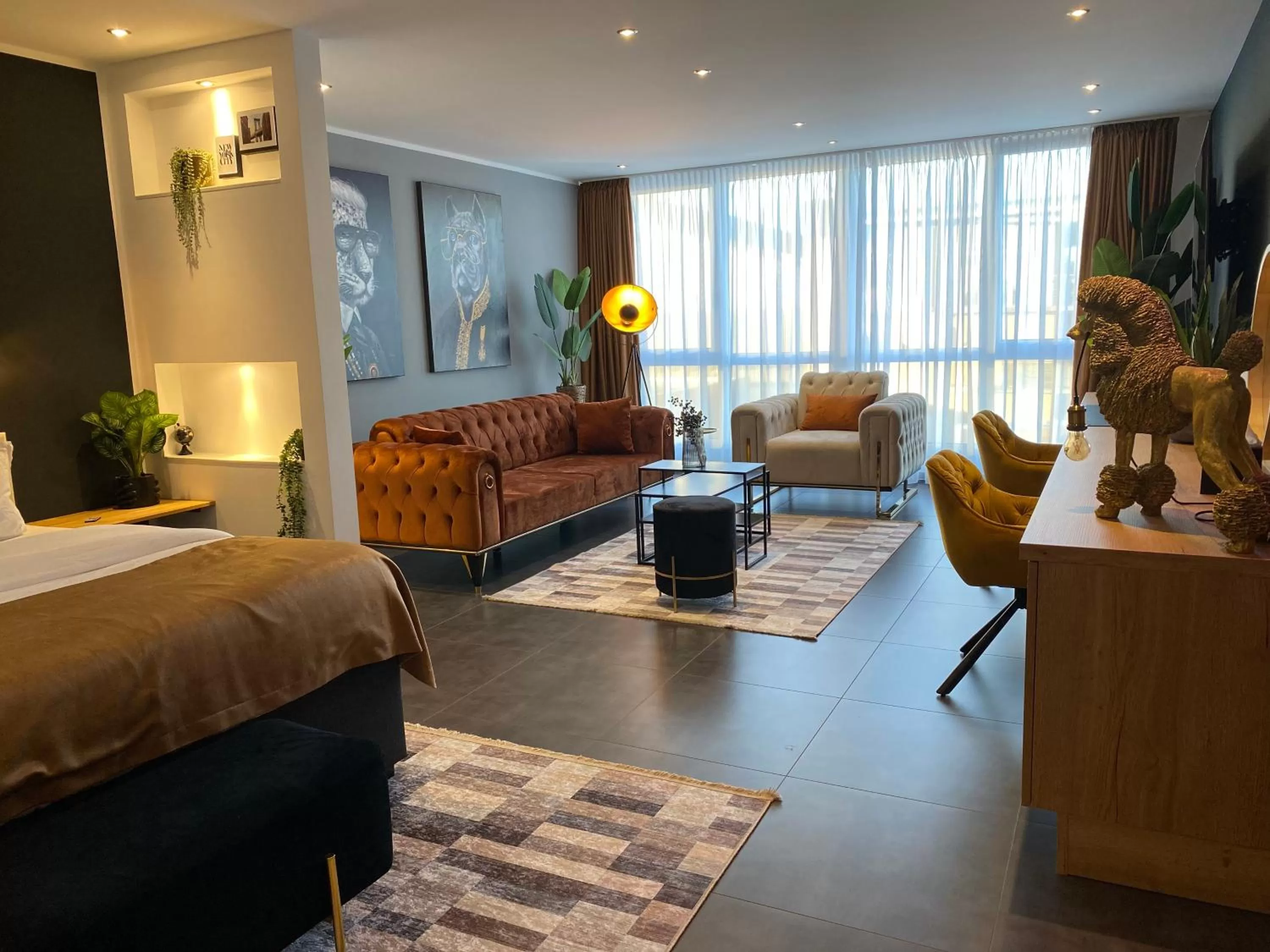 Bed in MARRAM Suitehotel