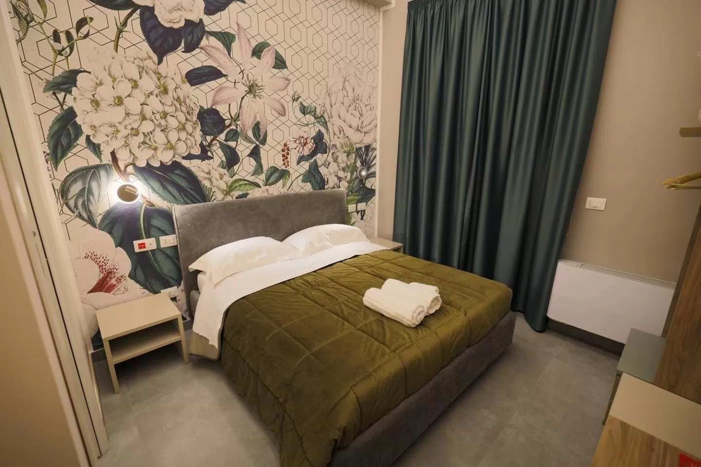 Bed in Brettia Guest Rooms