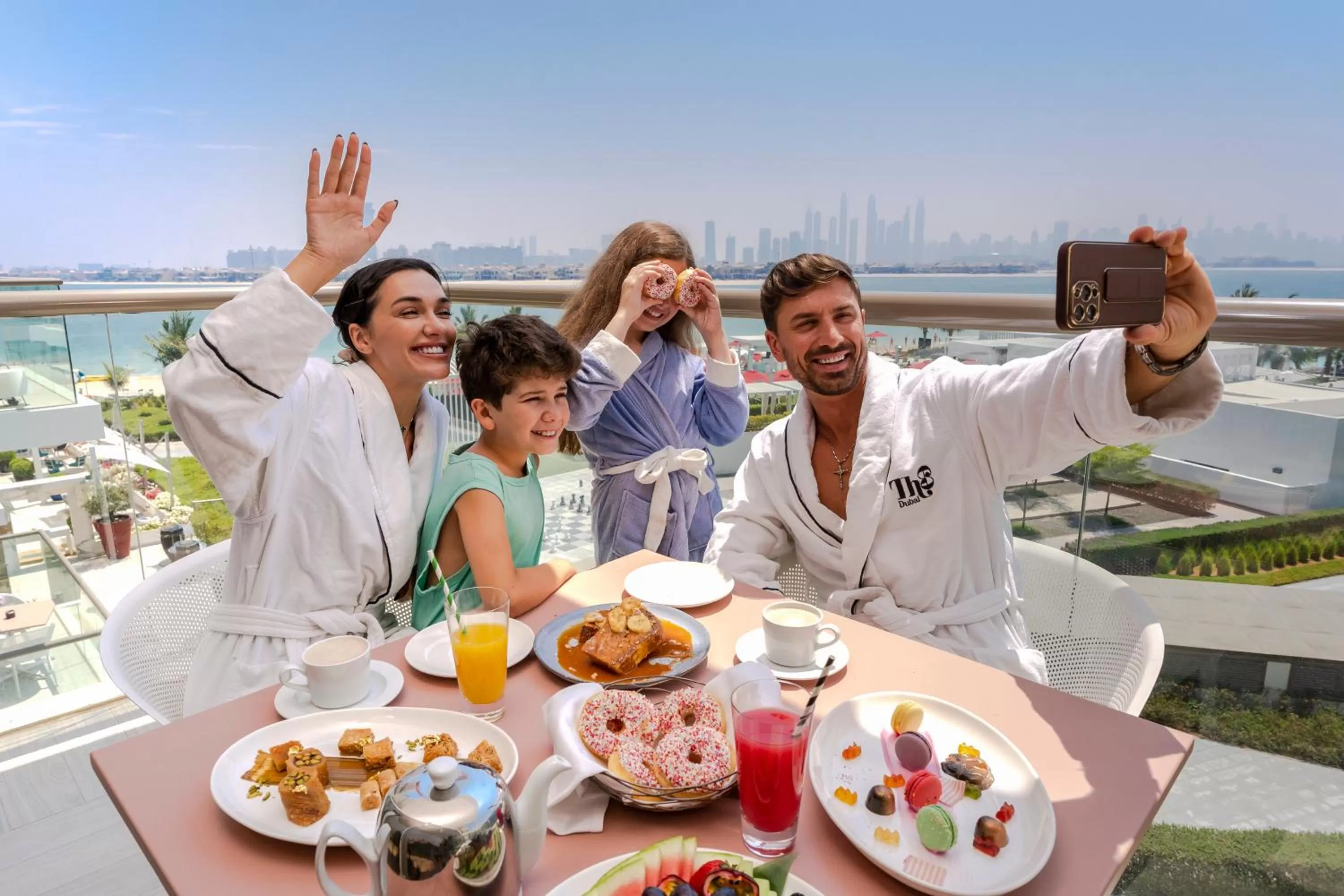 People in Th8 Palm Dubai Beach Resort Vignette Collection, an IHG hotel