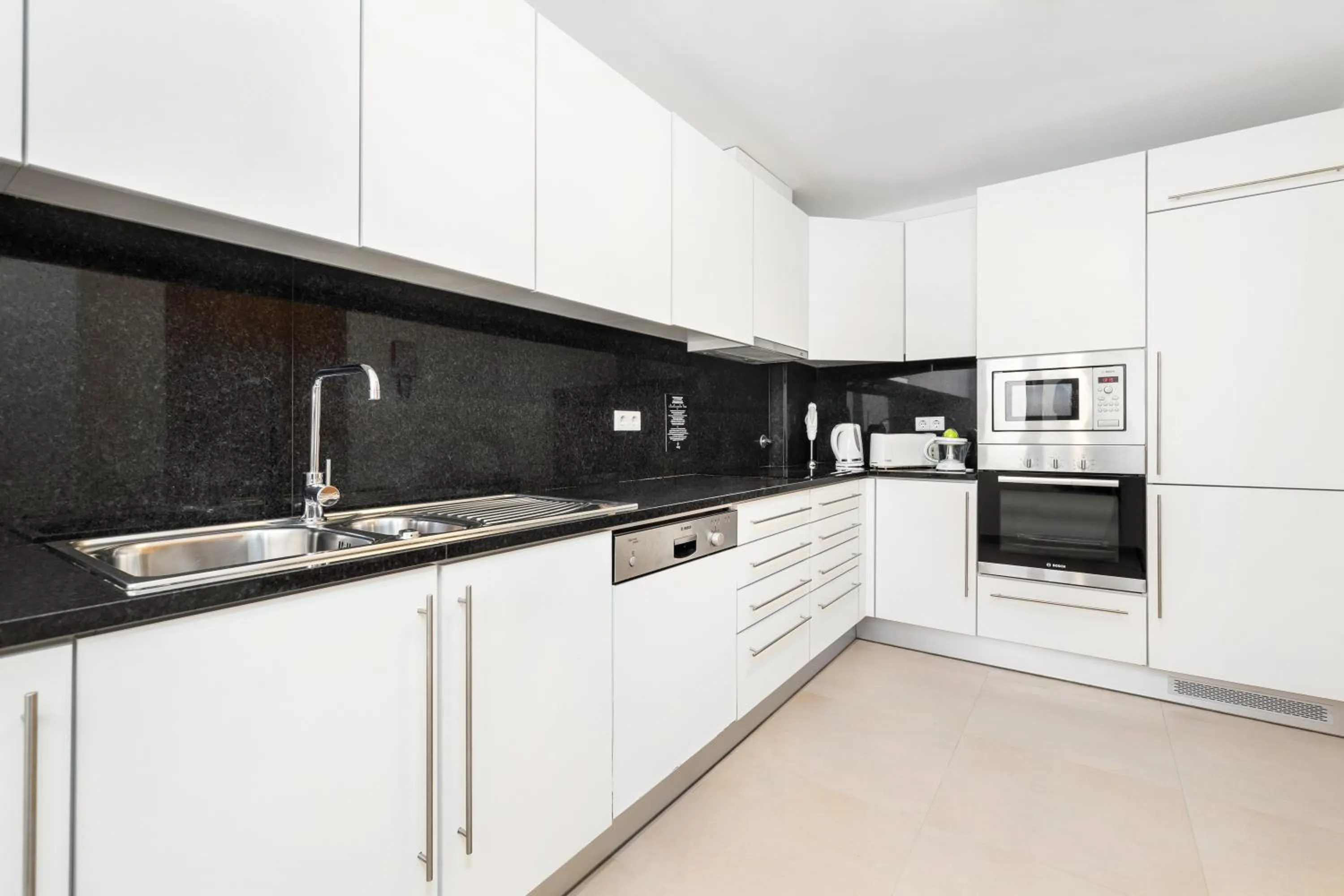 Kitchen or kitchenette in Eden Villas & Apartments