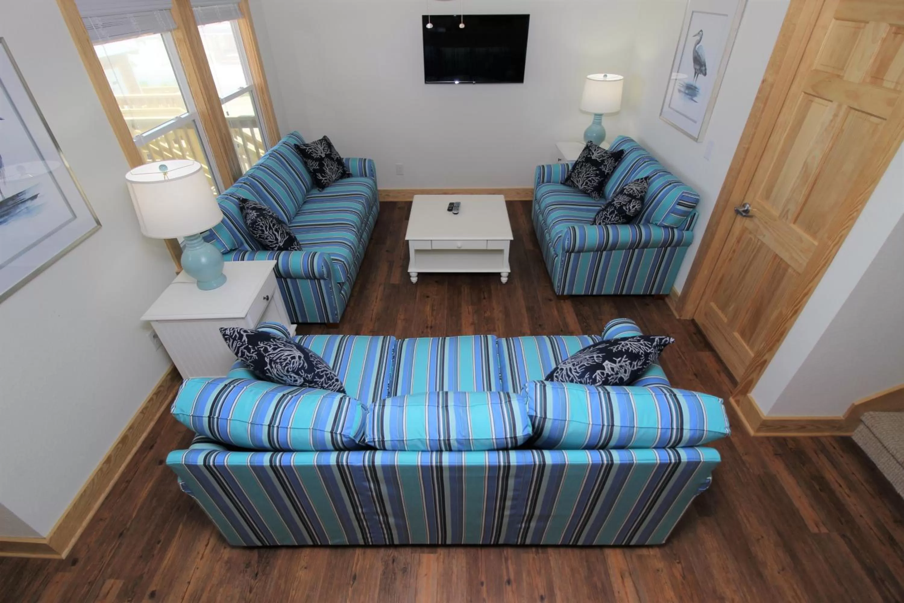Living room in Whalebone Ocean Cottages by KEES Vacations