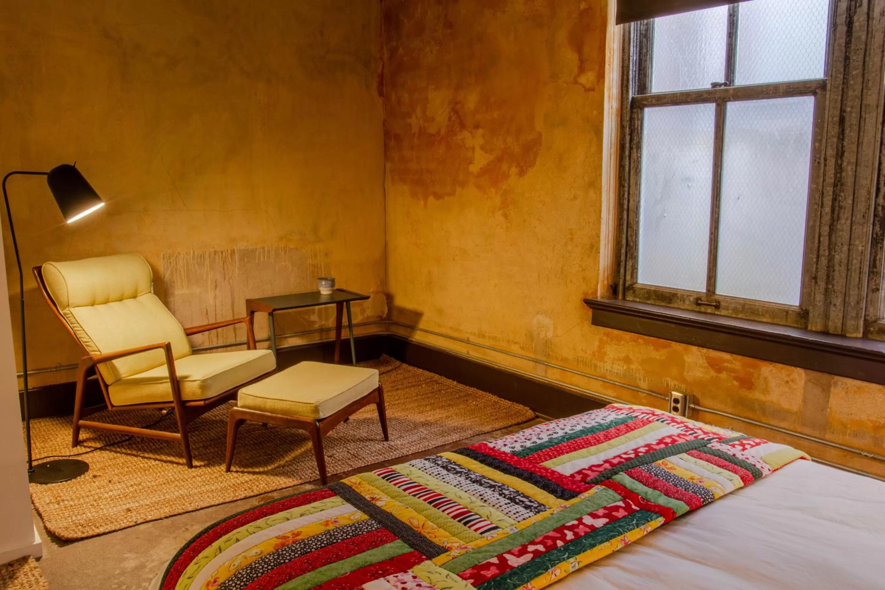 Bed in Travelers Hotel