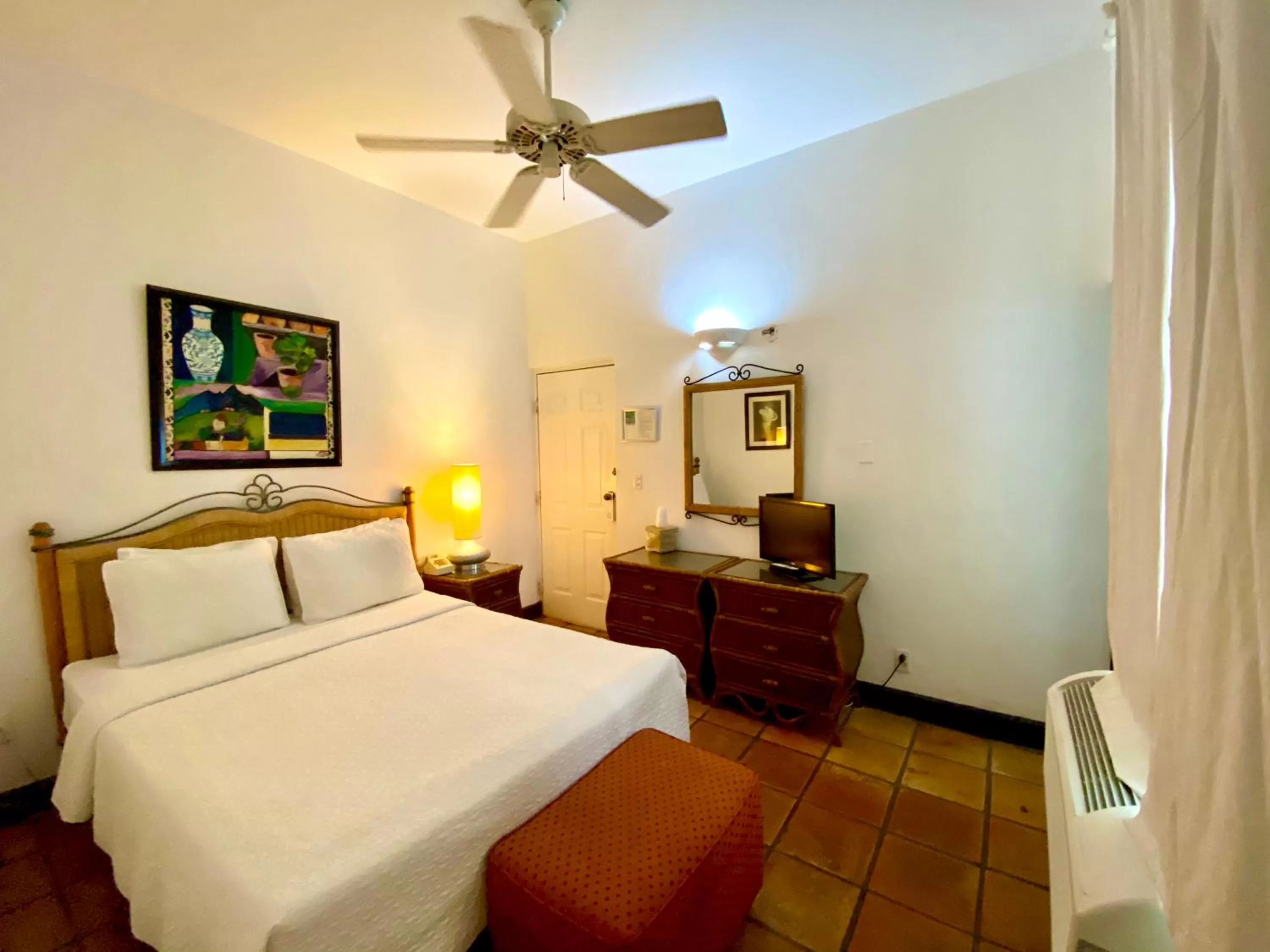 Bed in At Wind Chimes Boutique Hotel