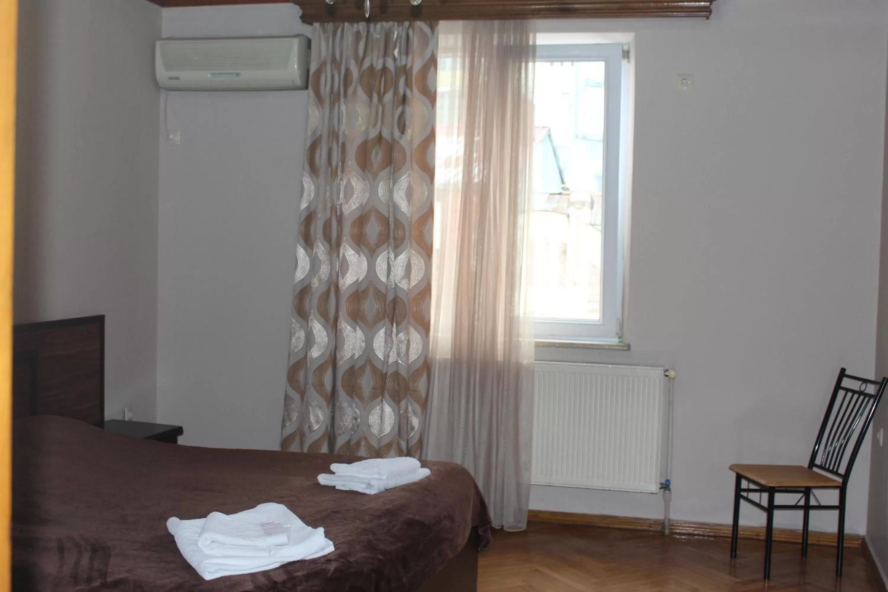 Photo of the whole room, Bed in CATTALEYA