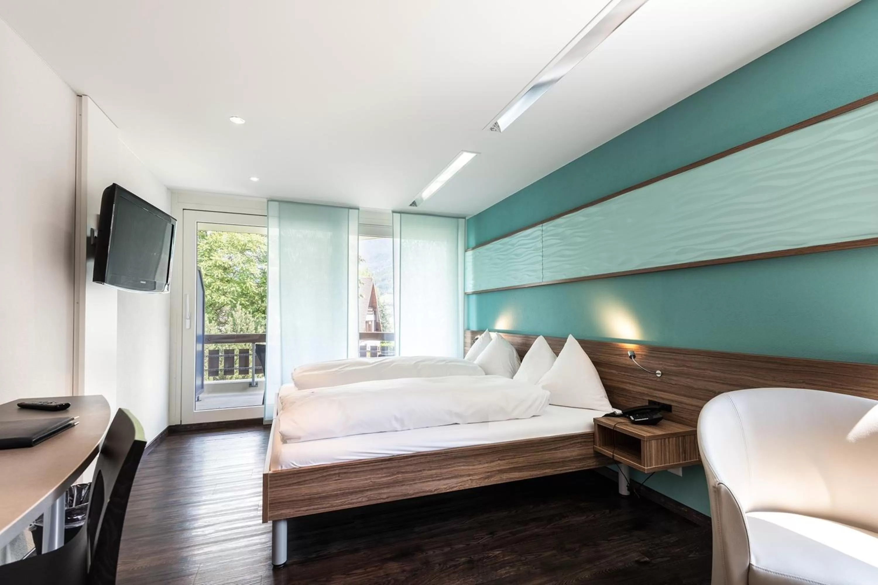 Bed in Hotel Nidwaldnerhof direkt am See