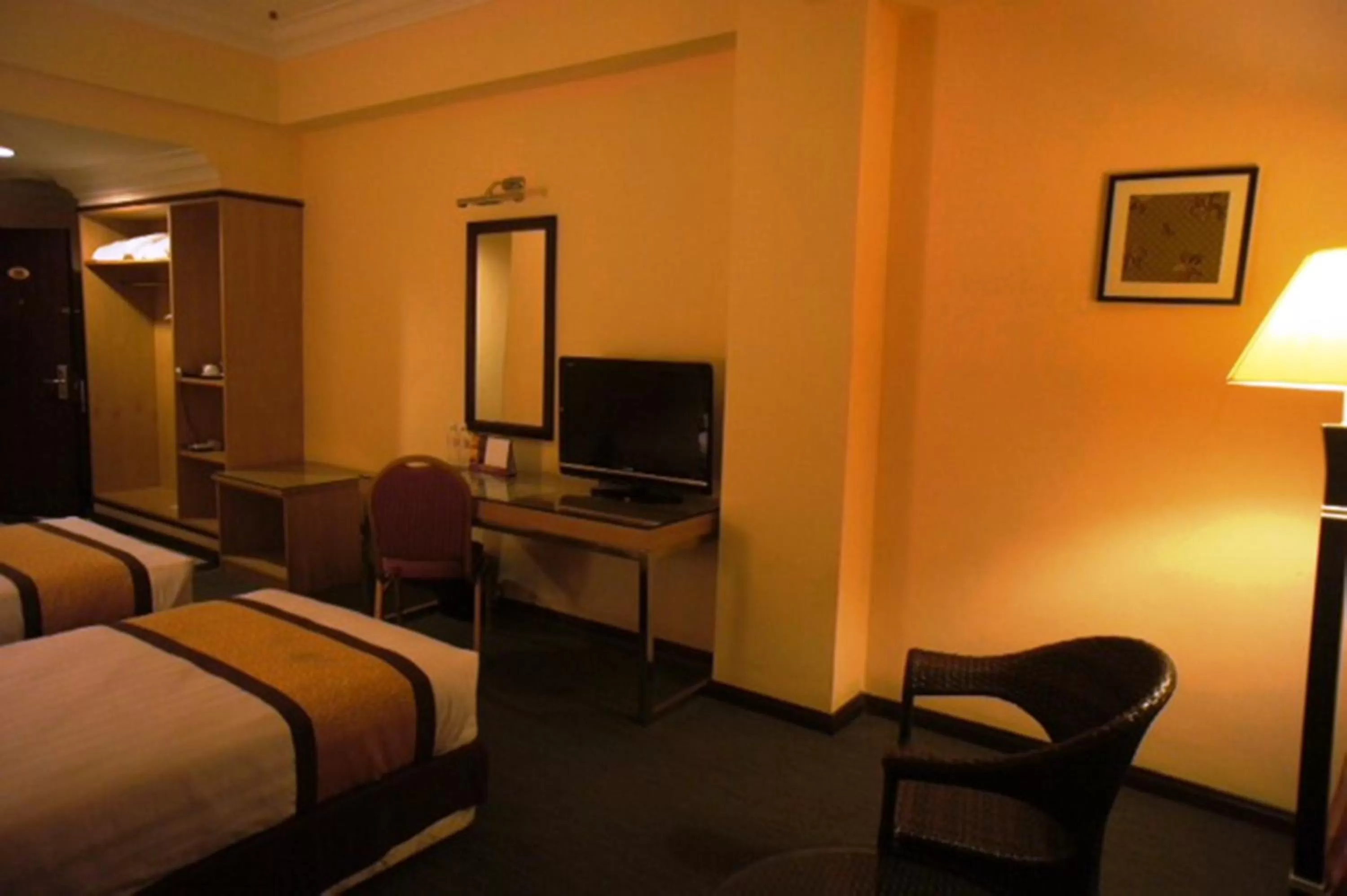 Bed in Tyng Garden Hotel