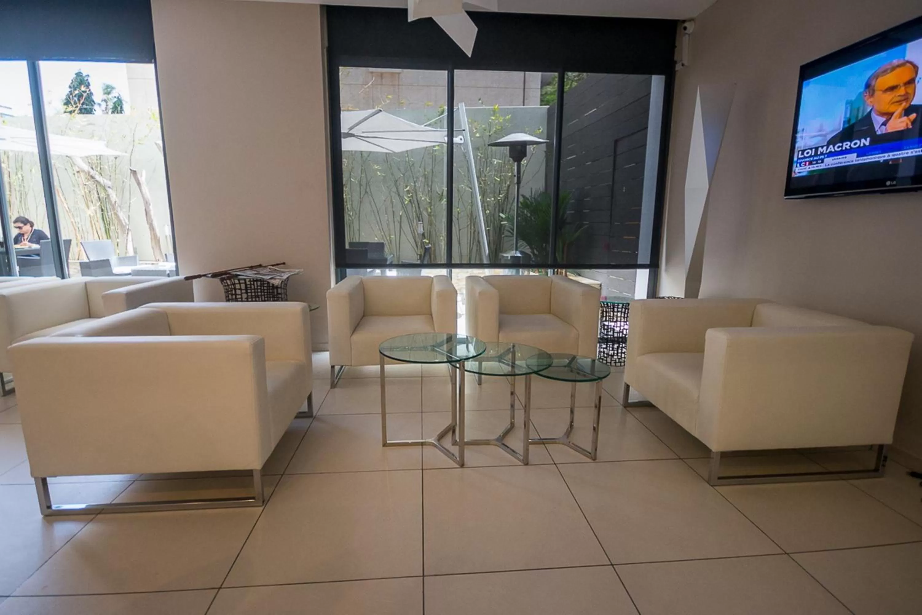 Communal lounge/ TV room in Rysara Hotel