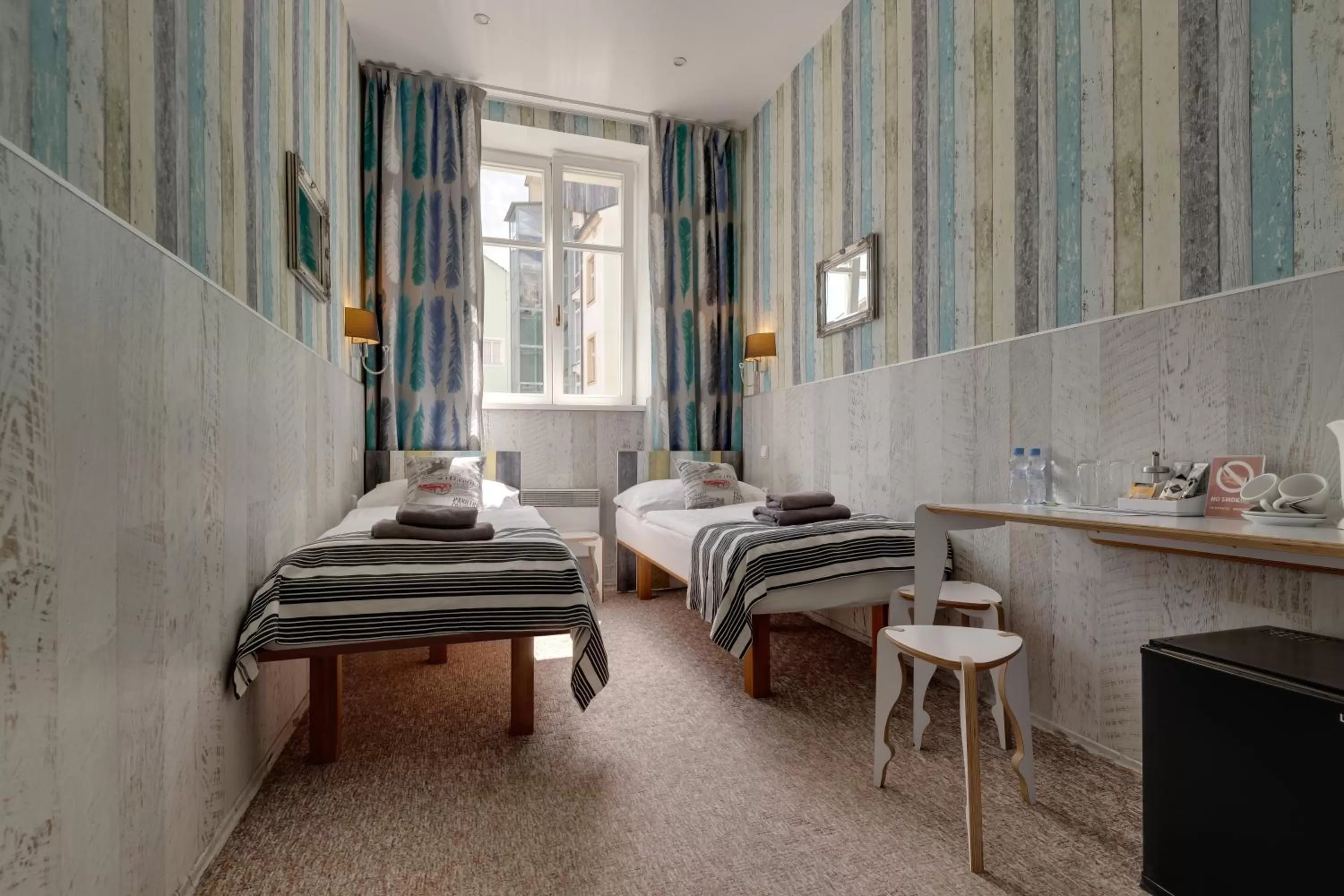 Bed in Royal Court Hotel