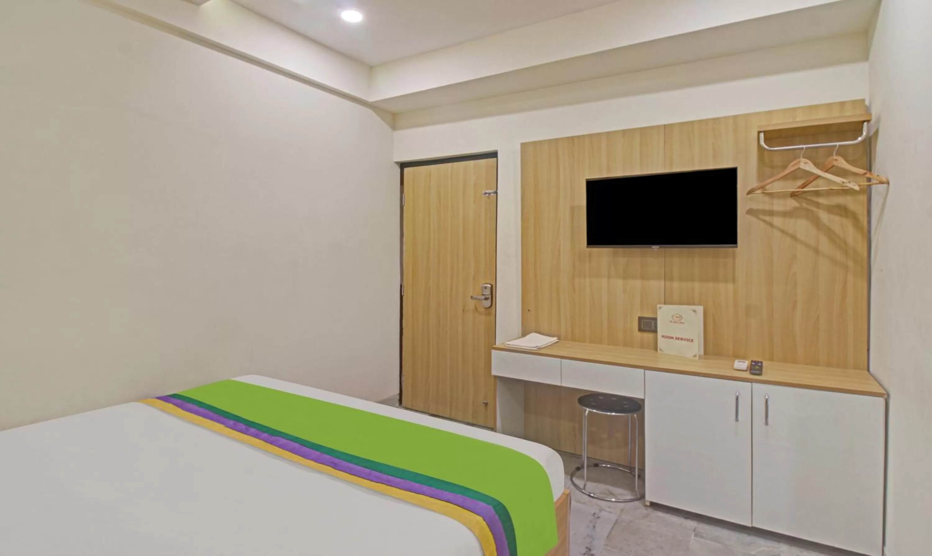 Bedroom, Bed in Treebo The Boss