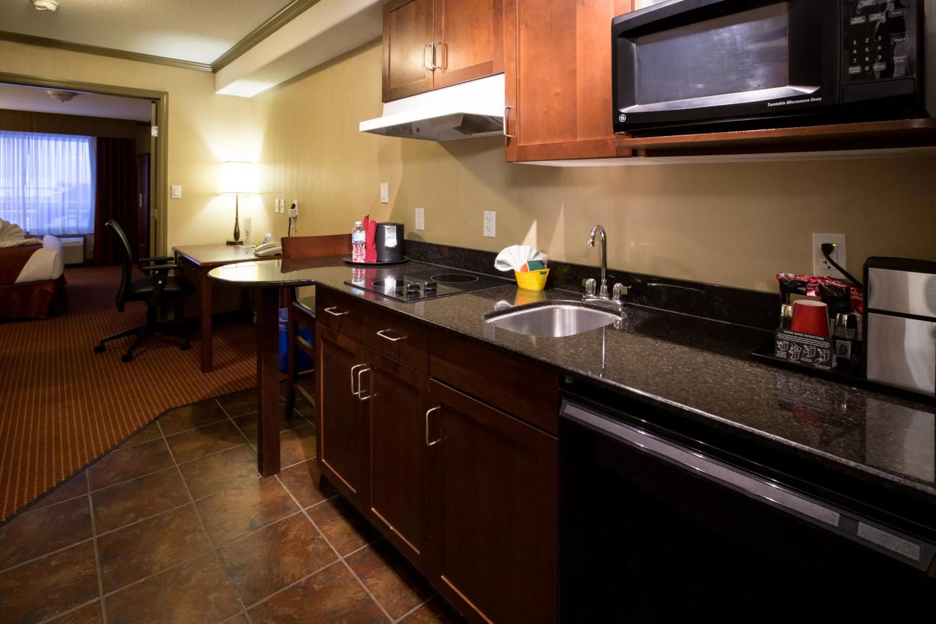 Kitchen or kitchenette in Merit Hotel & Suites