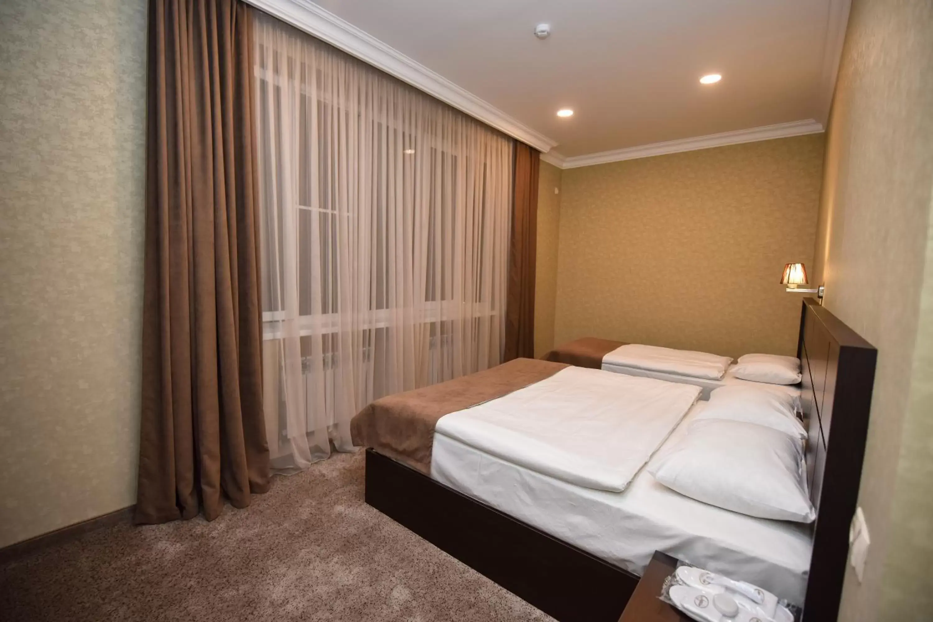 Deluxe Triple Room in Laguna Hotel Deluxe Triple Room in Laguna Hotel