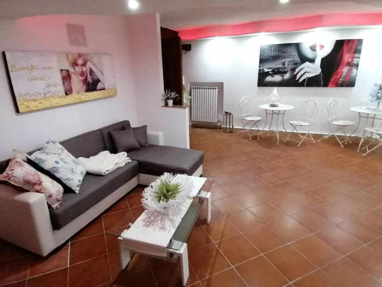 Seating area in Maison Rinaldi SrL