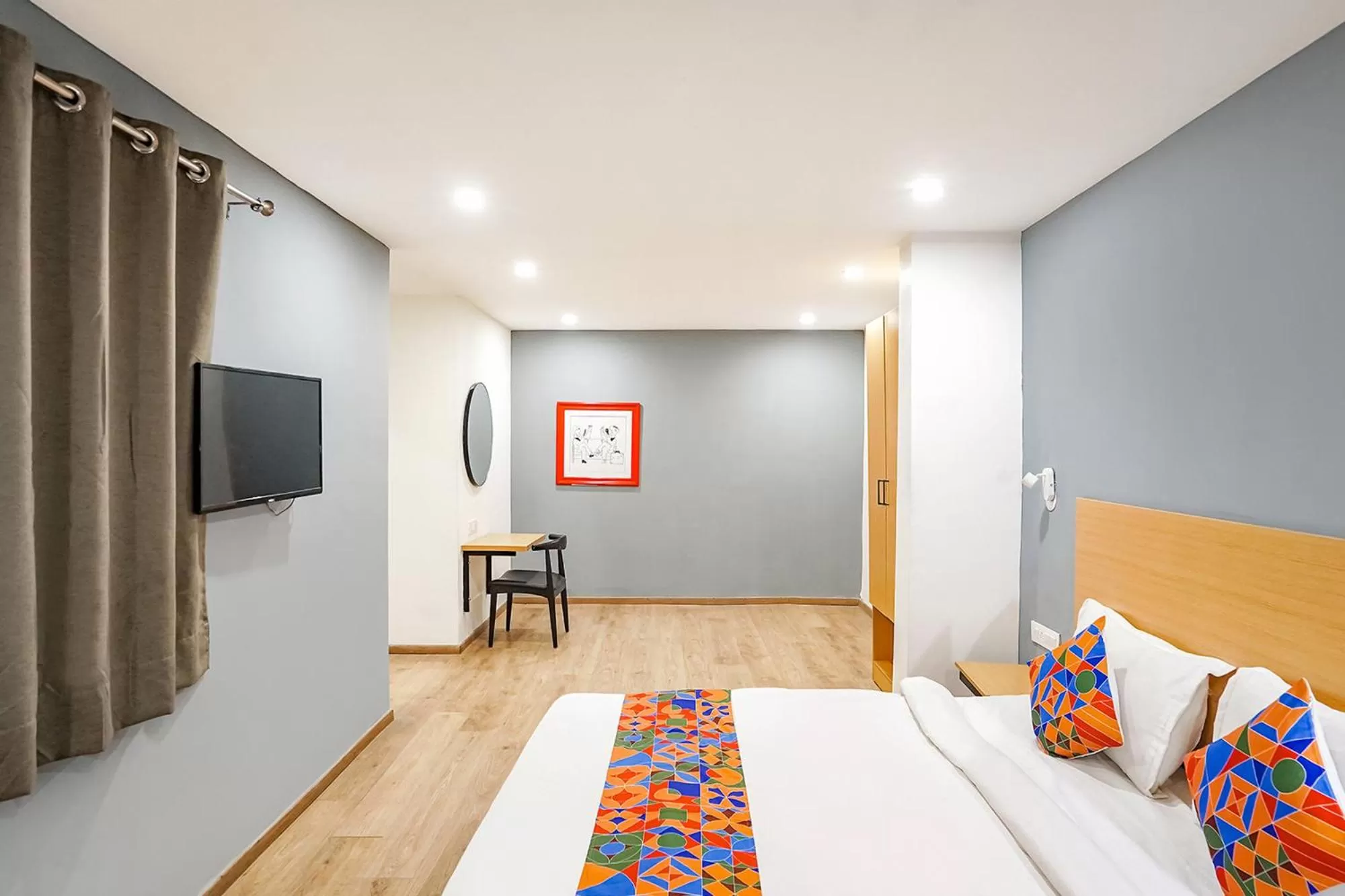 Communal lounge/ TV room, Bed in FabHotel F9 Sector 121