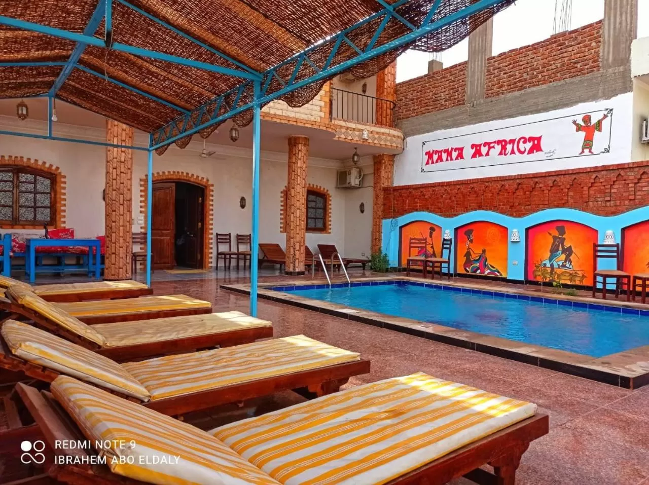 Swimming pool in Mama Africa Apts & Studios