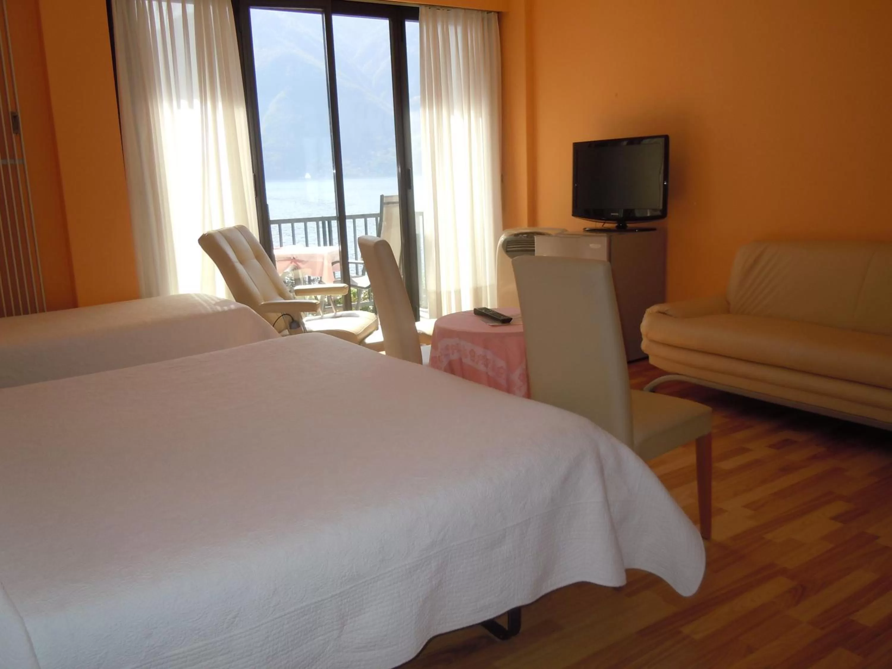 Bed in Swiss Lodge Nassa Garni