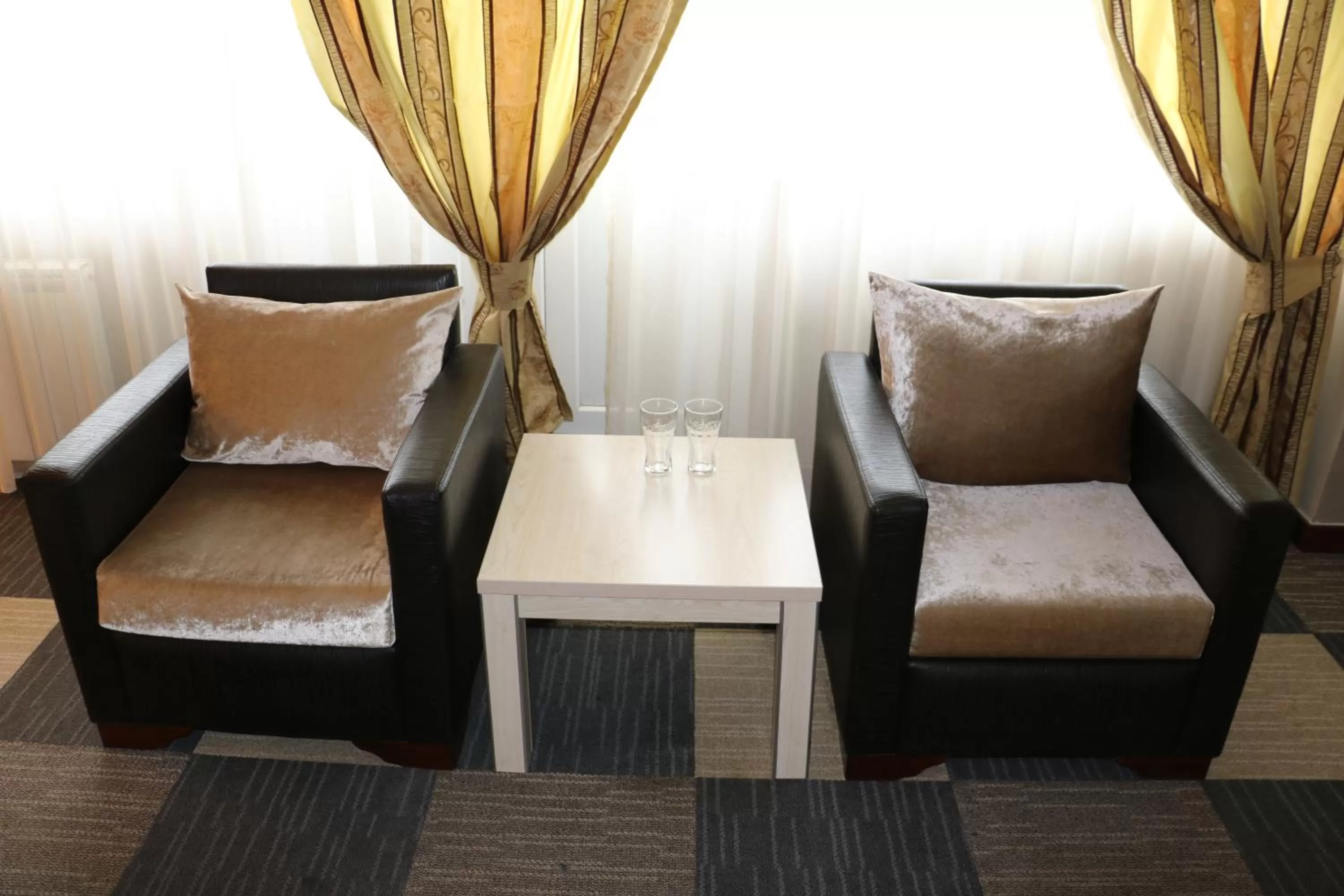 Shower, Seating Area in Aktau Hotel