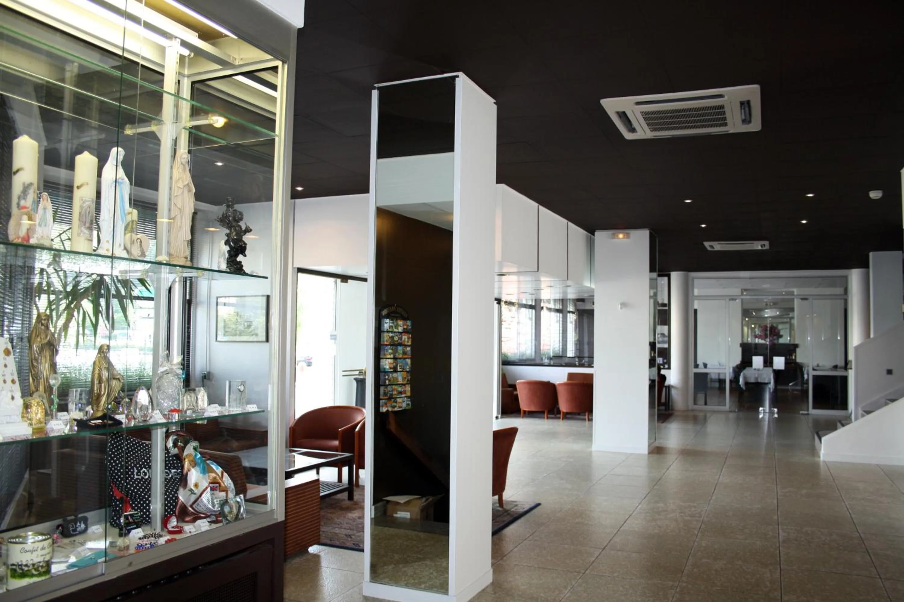 Lobby or reception in Adonis Lourdes - Notre Dame de la Sarte