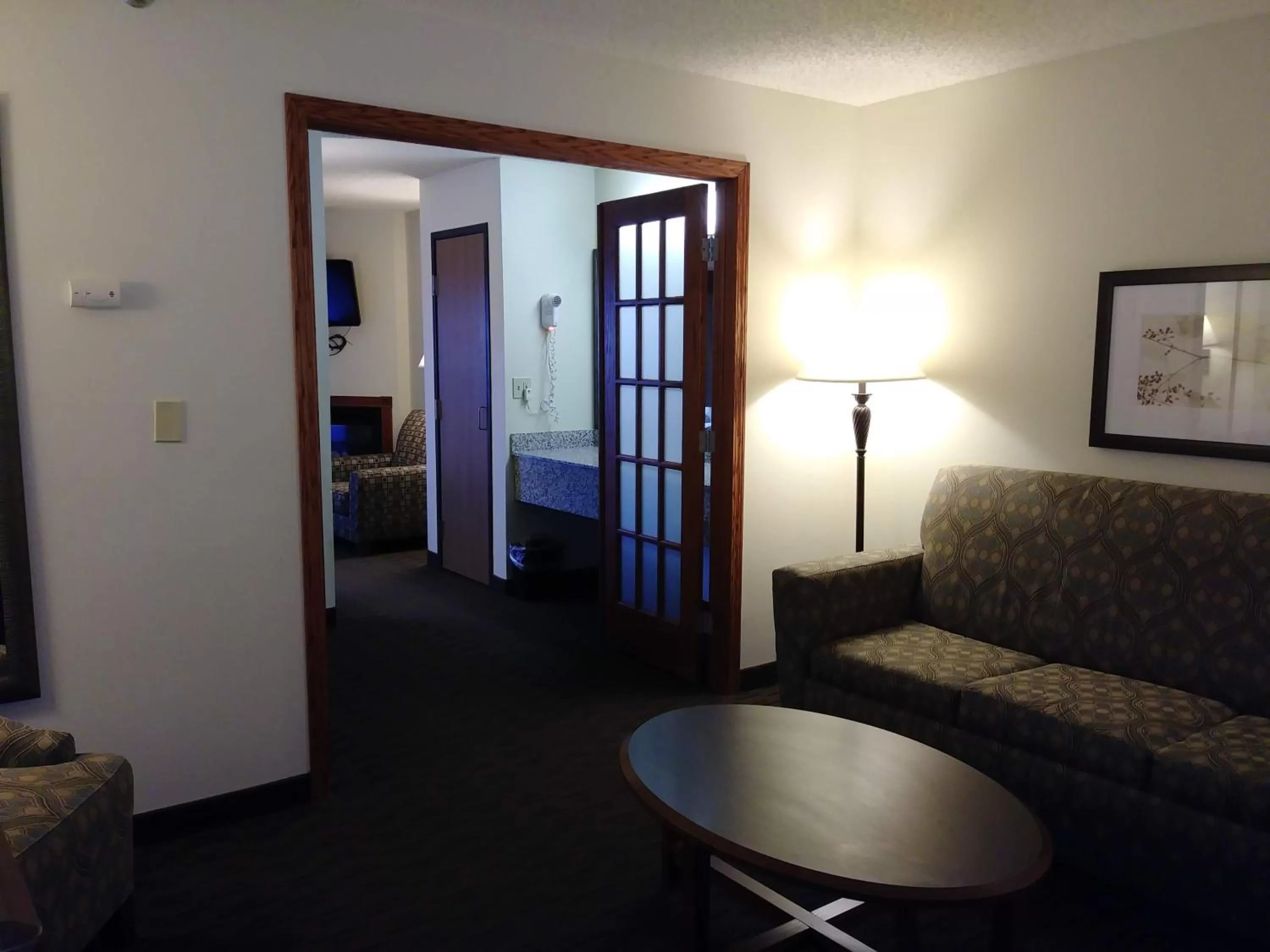 Living room in AmericInn by Wyndham Windsor Ft. Collins