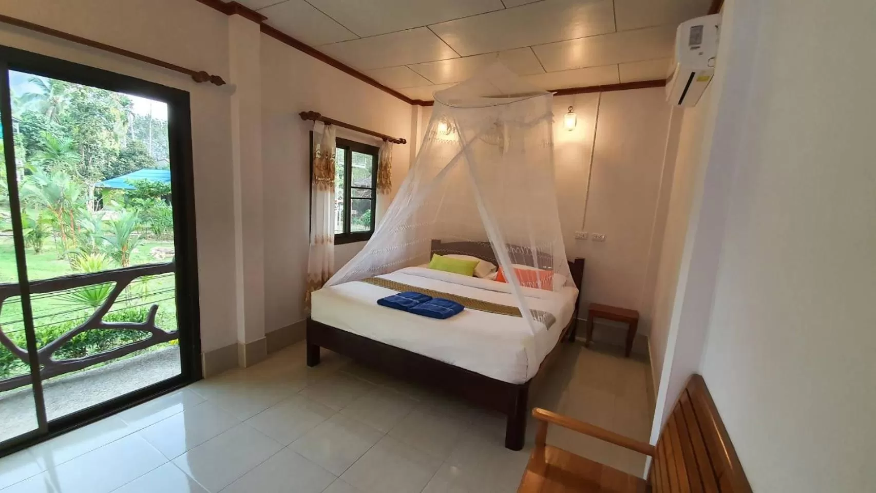 Bed in Tree Tops River Huts