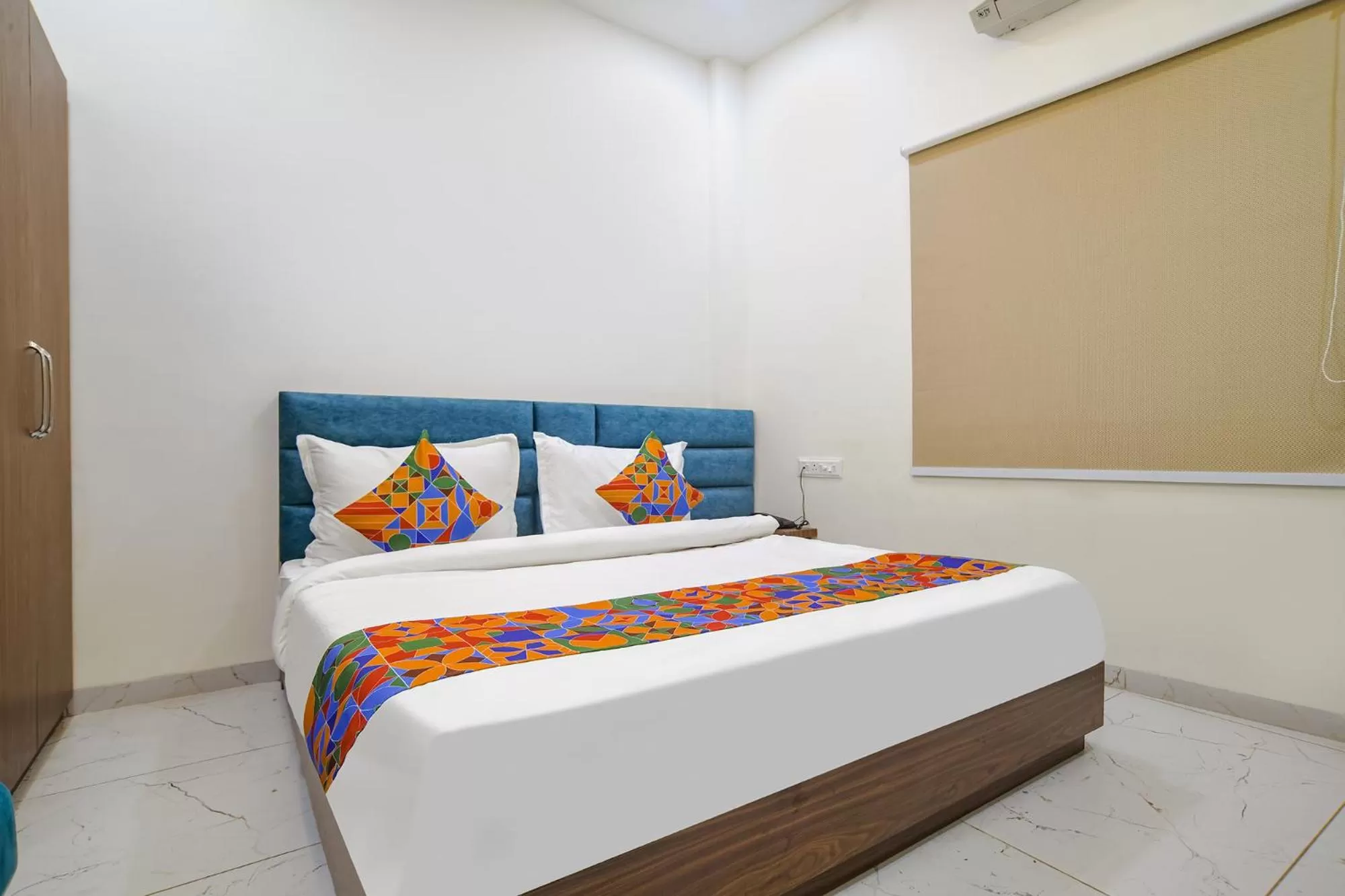 Bed in FabHotel Ramya