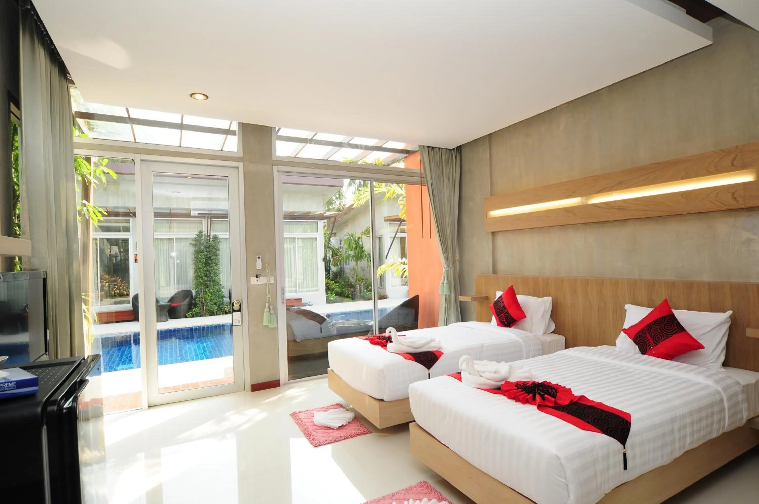 Photo of the whole room, Bed in Phu NaNa Boutique Hotel - SHA Plus