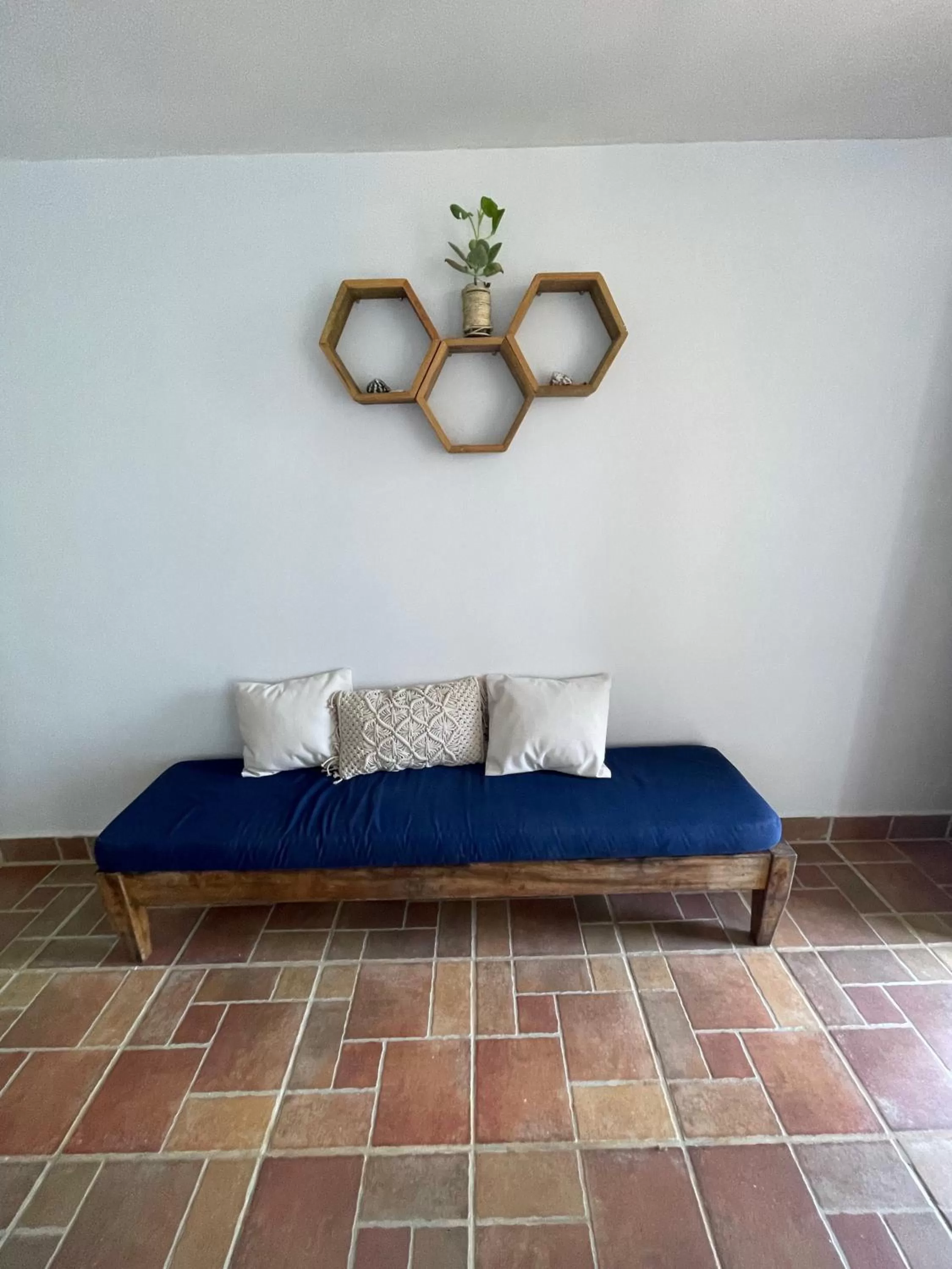 Bedroom, Seating Area in Bird Island Bungalows