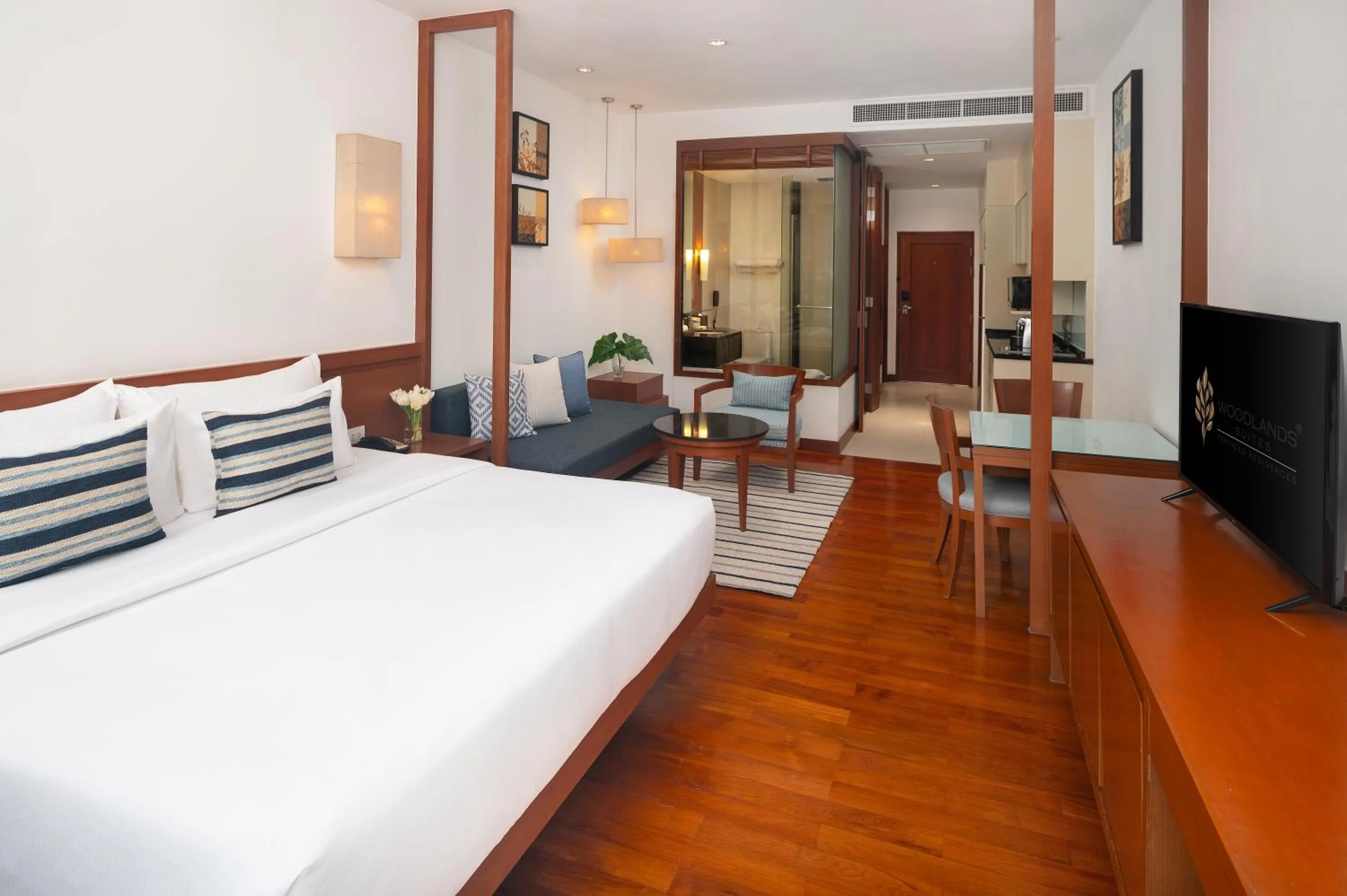Bedroom, Bed in Woodlands Suites Serviced Residences