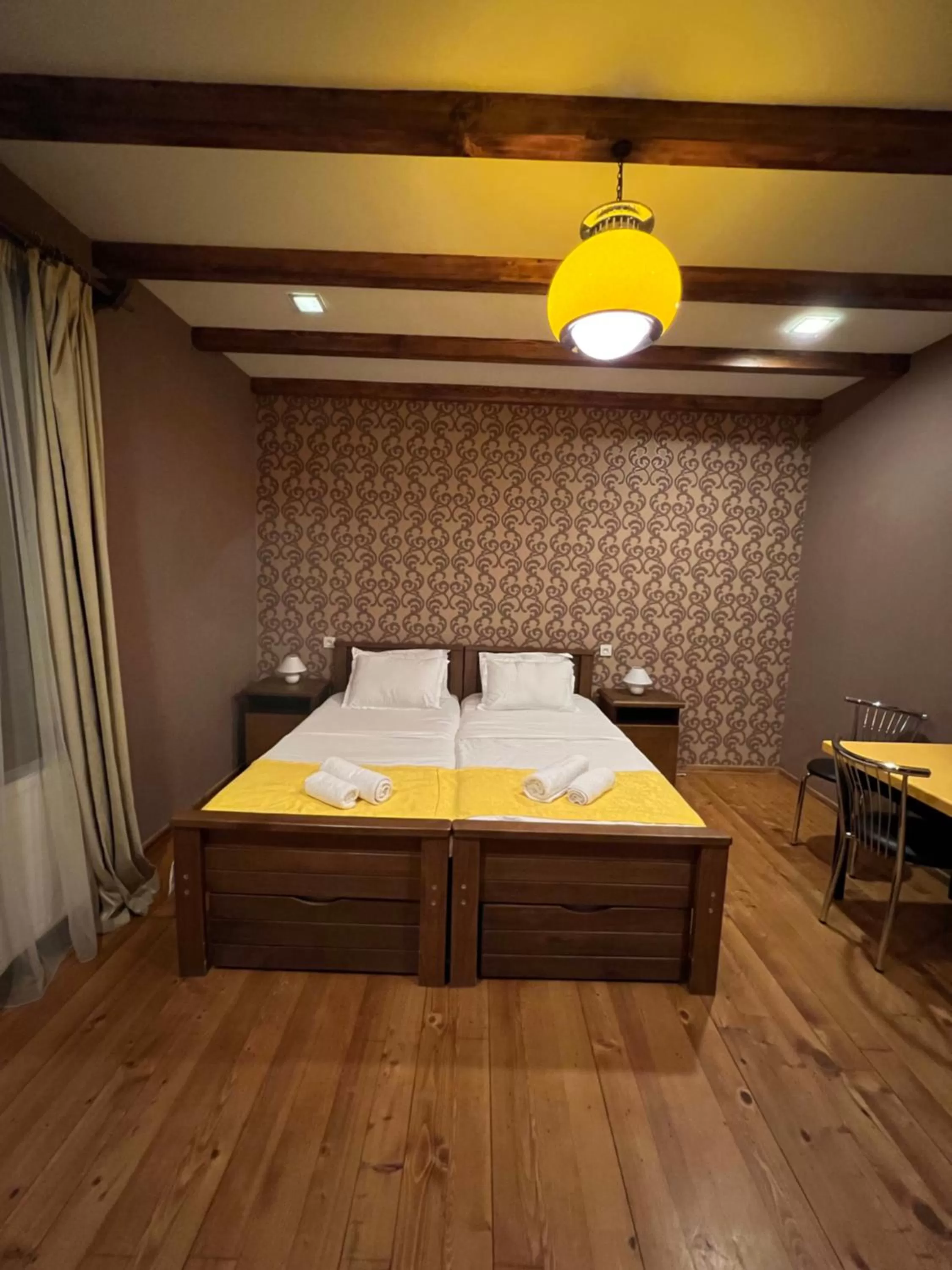 Bed in Borjomi Yellow Hotel