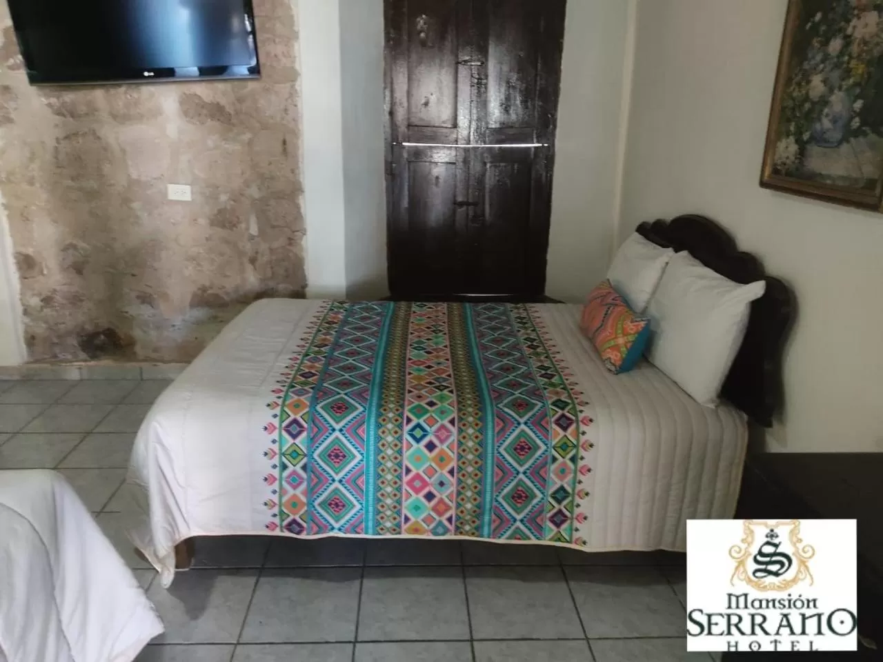 Bed in Mansion Serrano Hotel