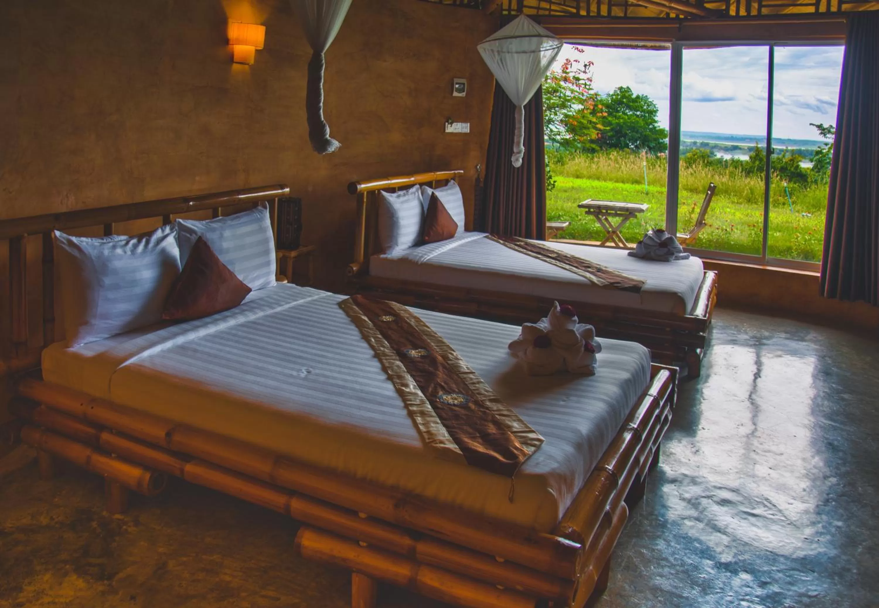 Bed in Hanchey Bamboo Resort