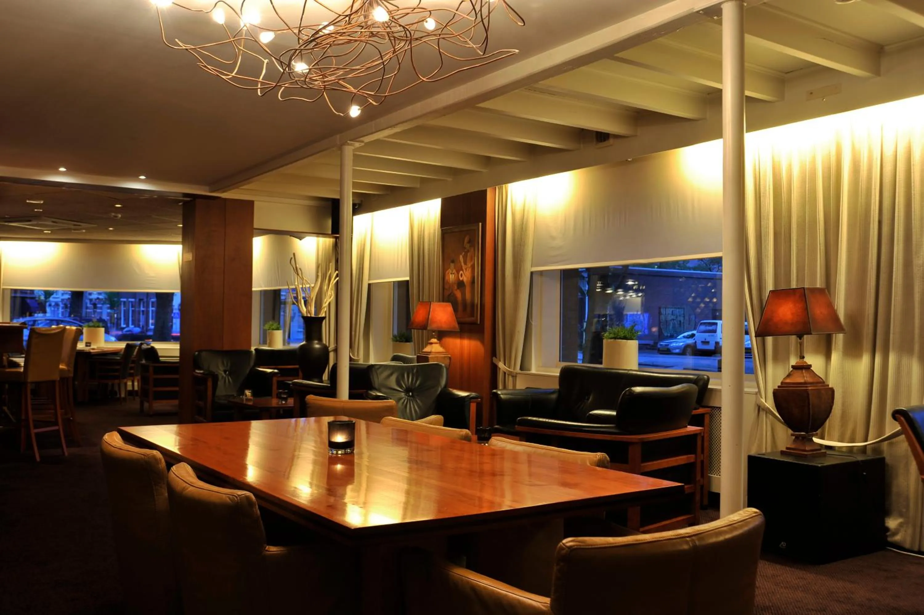 Communal lounge/ TV room in City Hotel Bergen op Zoom