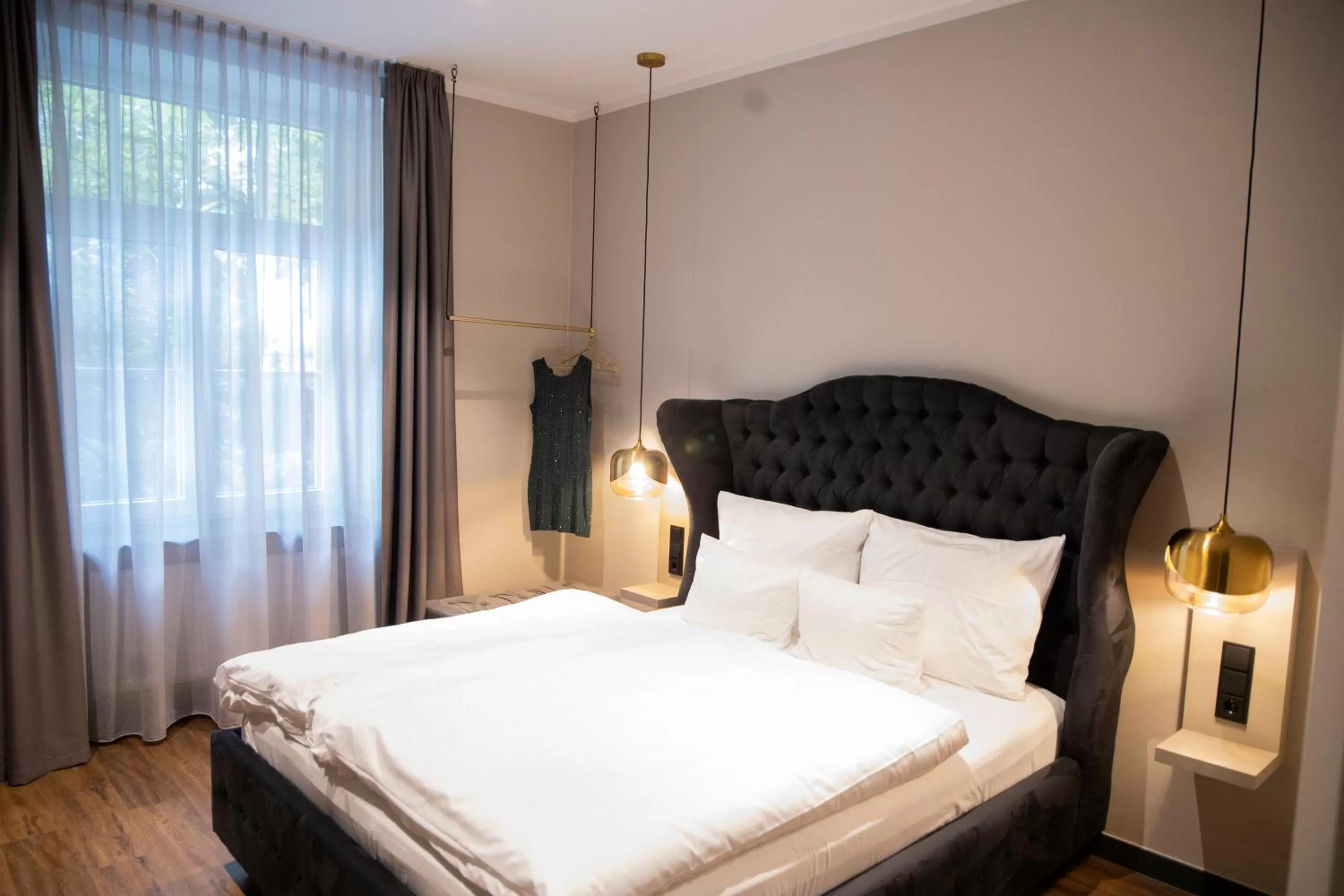 Bed in Munich Rooms Hotel