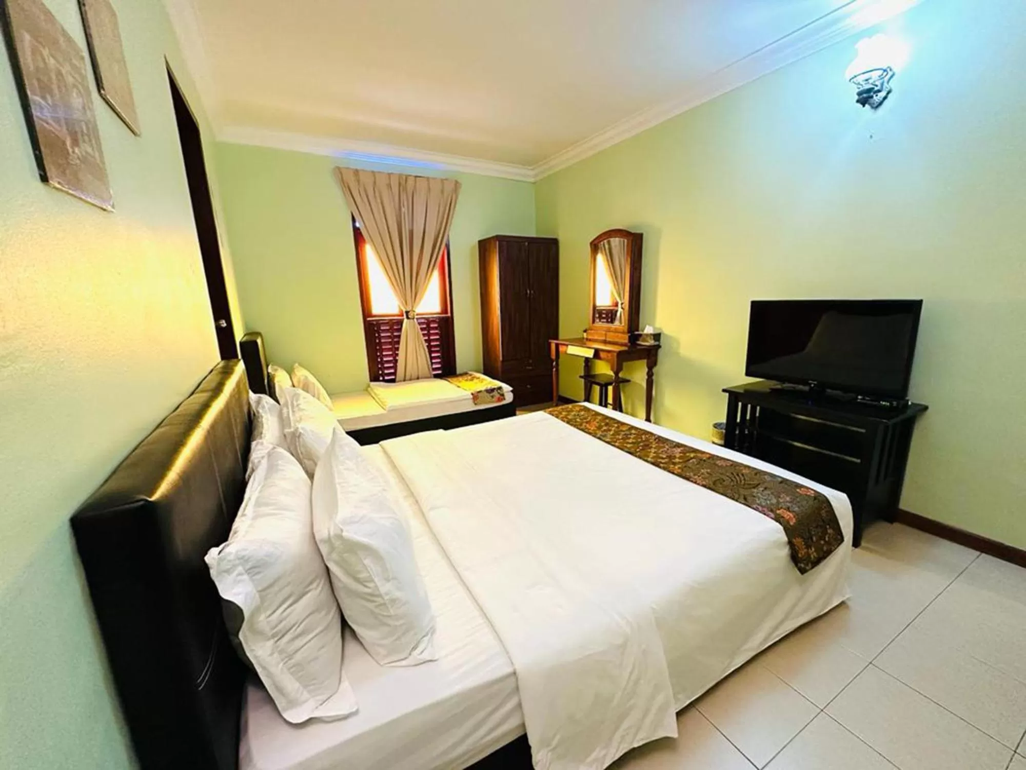 Bed in MORTEN VILLA MELAKA