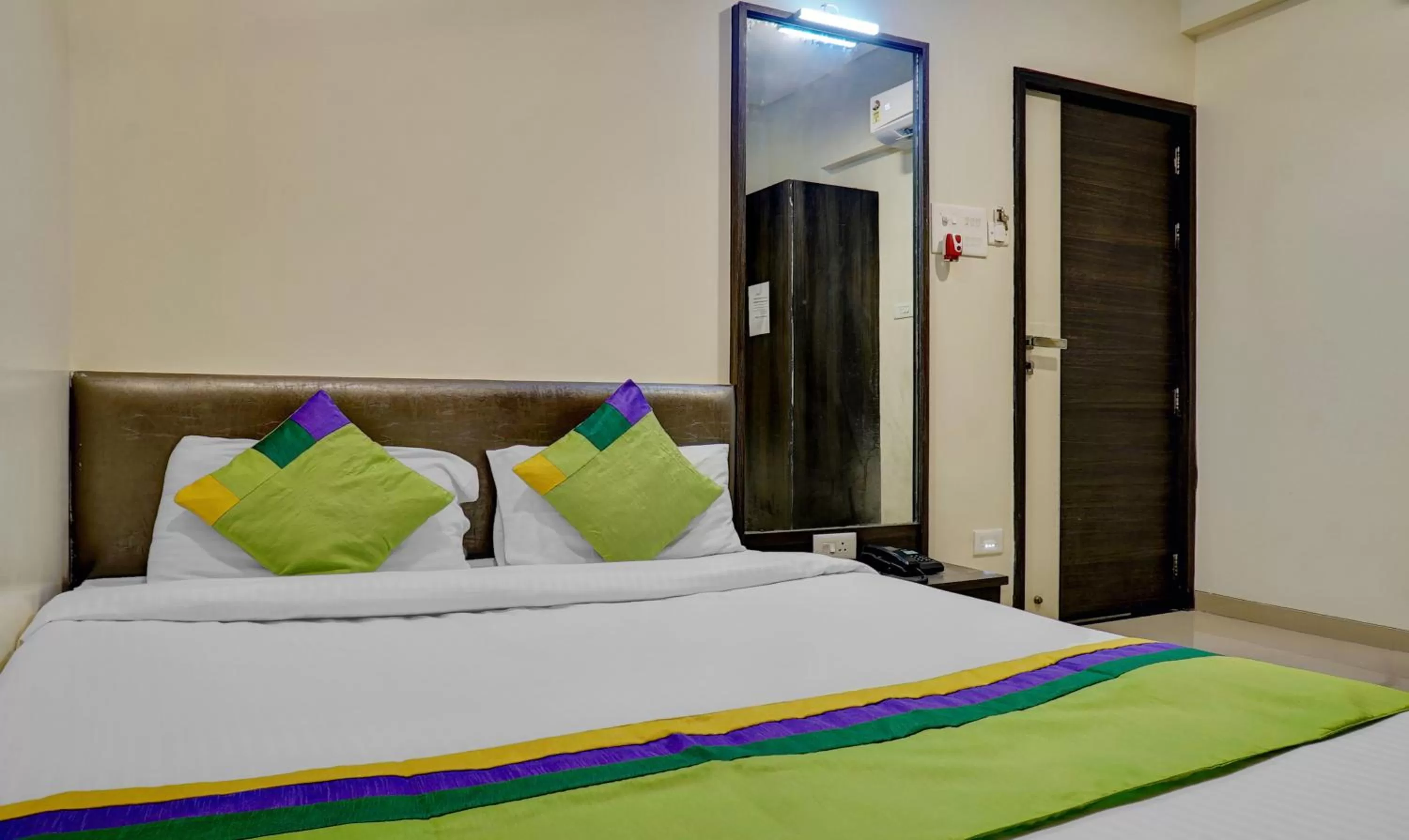 Bedroom, Bed in Treebo Bhagyashree Executive