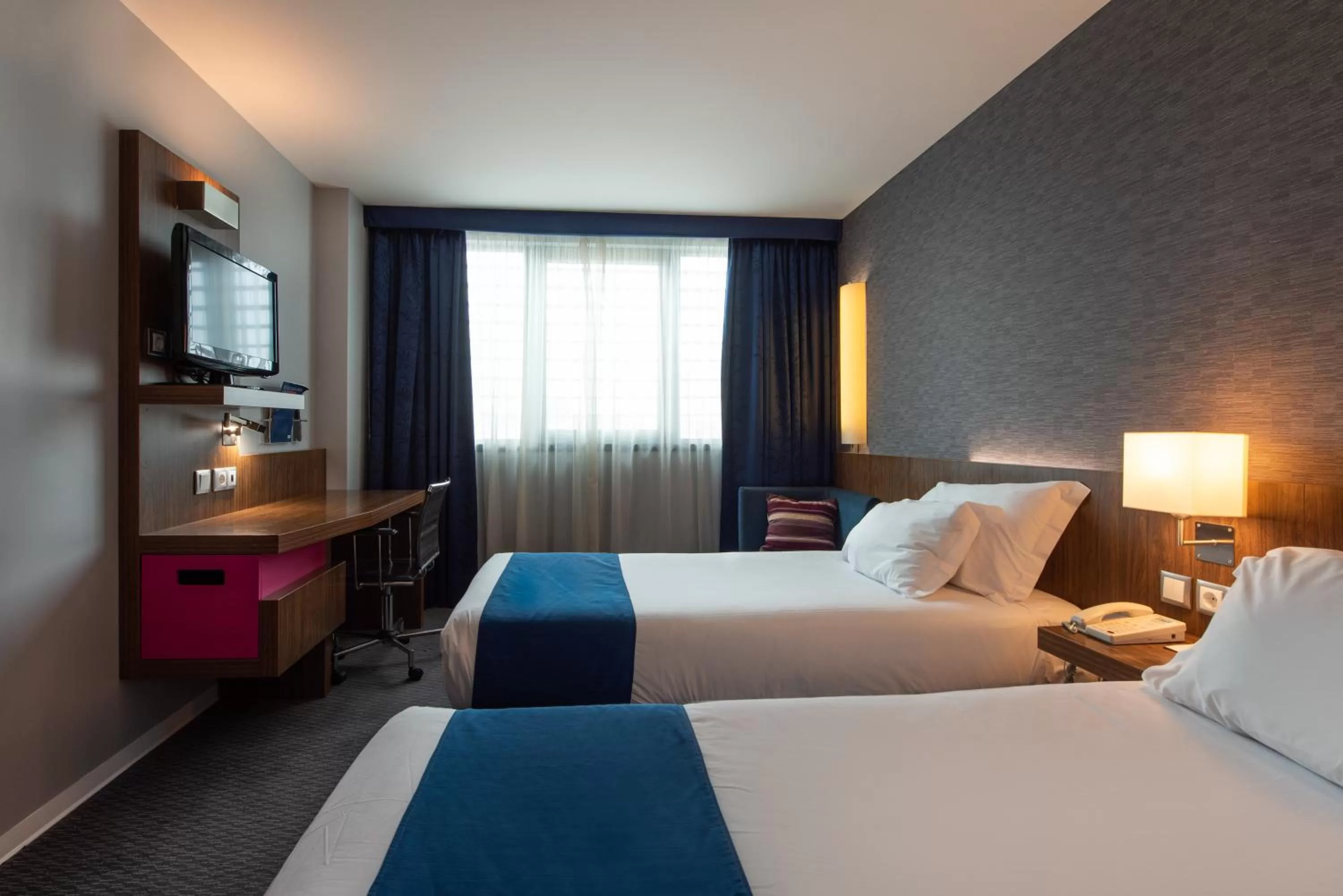 Photo of the whole room, Bed in Holiday Inn Express Lisbon Airport by IHG