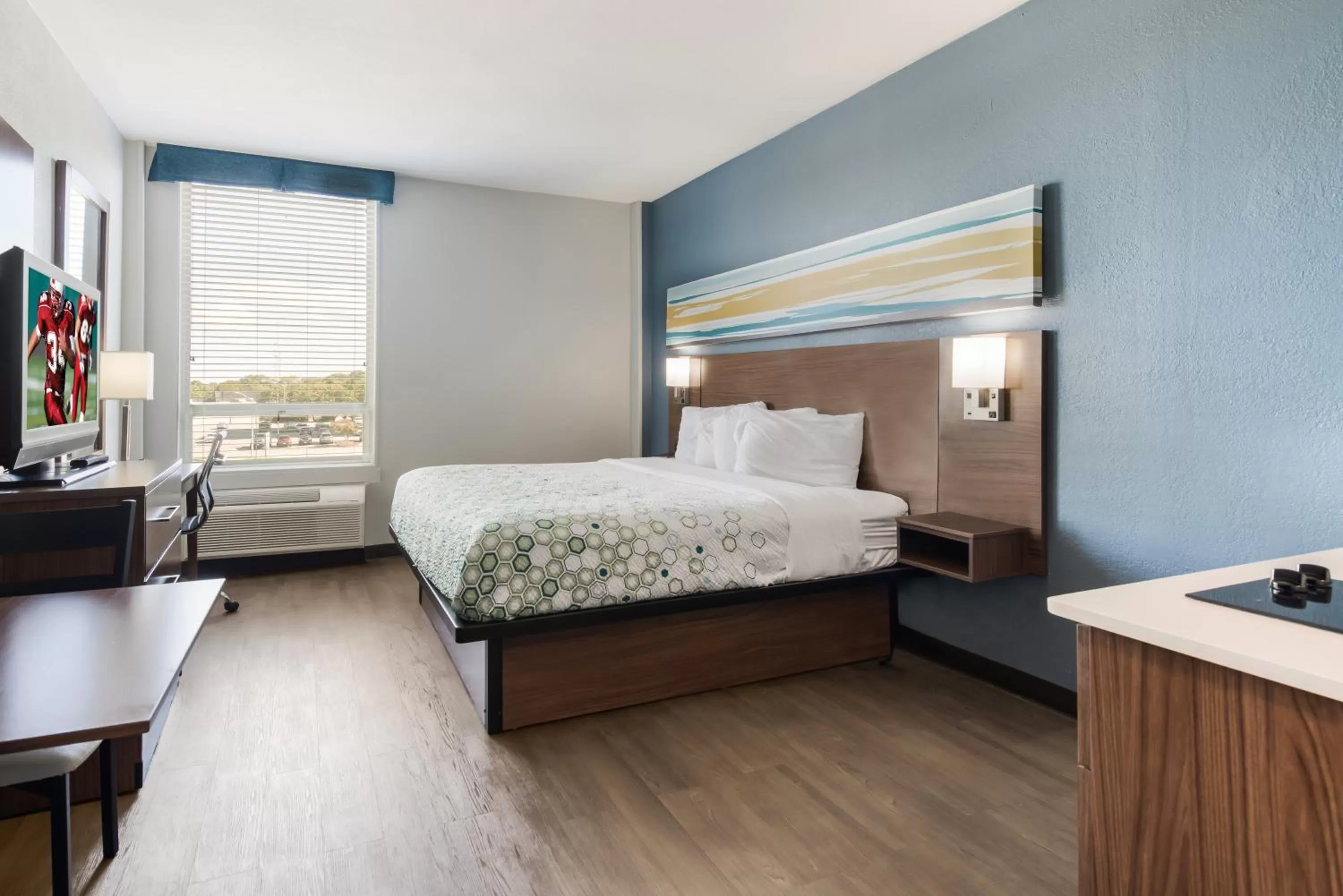 Bedroom, Bed in HomeTowne Studios by Red Roof Newport News - Hampton West