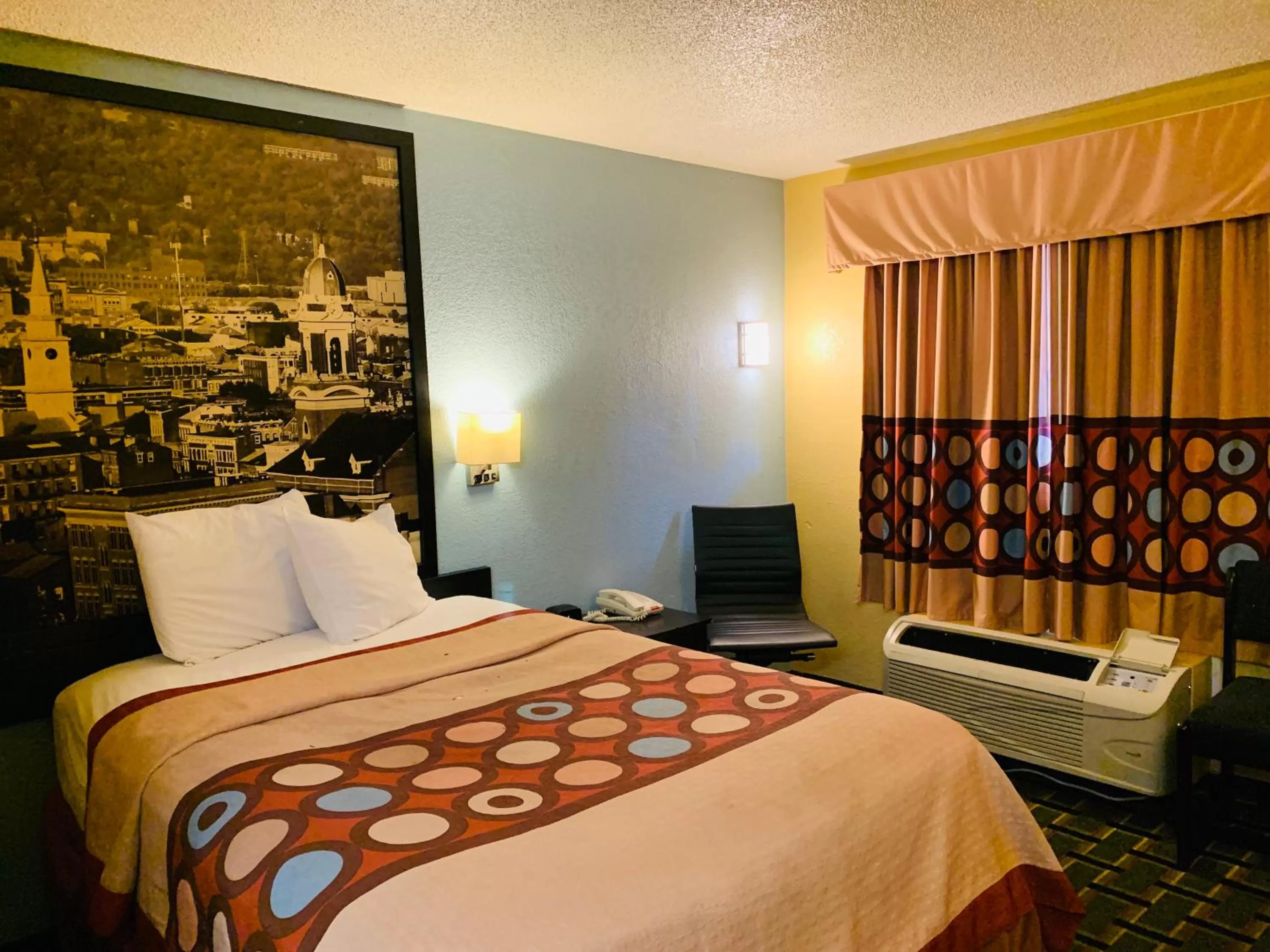 Bed in Super 8 by Wyndham Cincinnati-Springdale OH