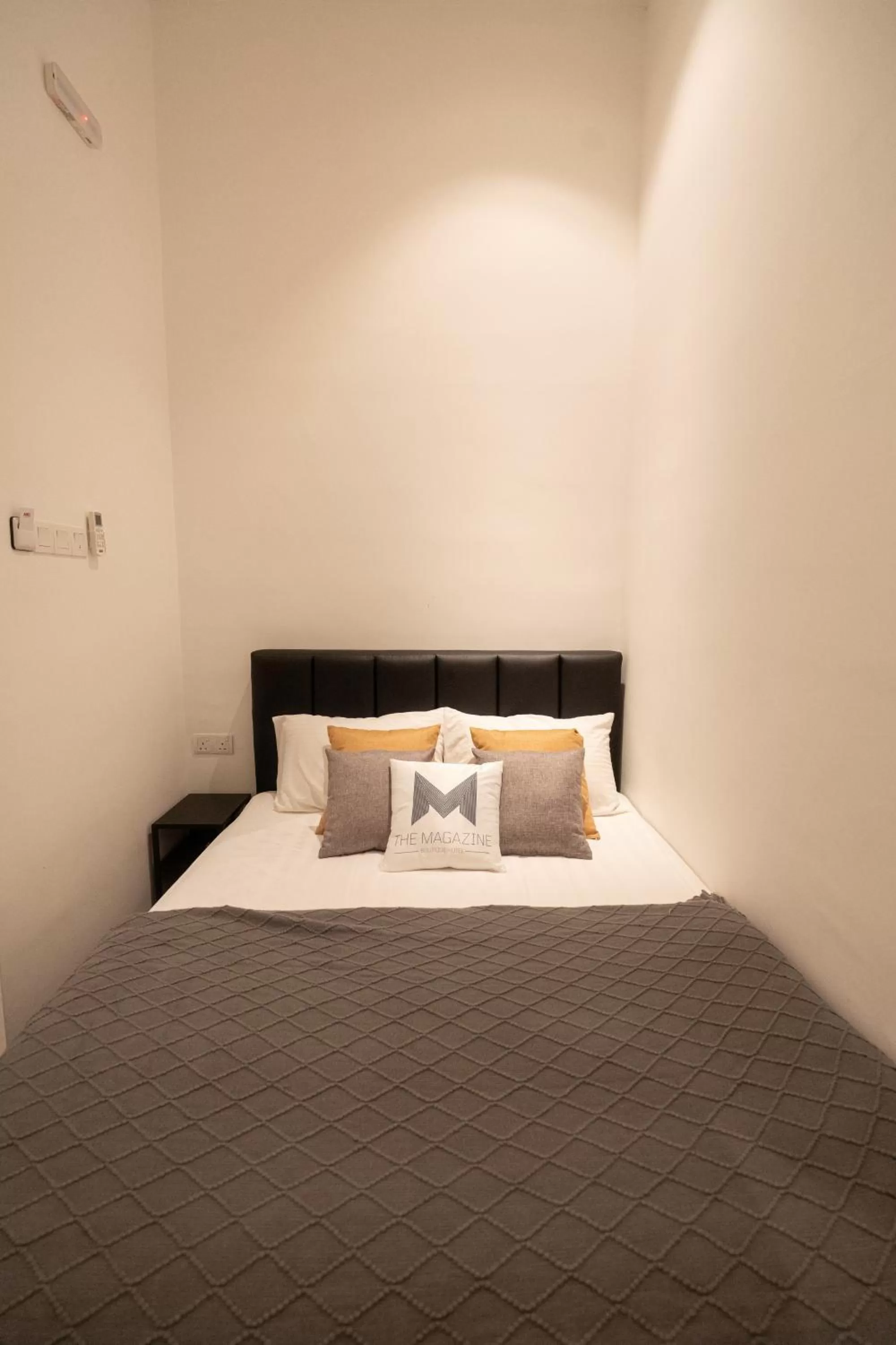 Bed in The Magazine Boutique Hotel