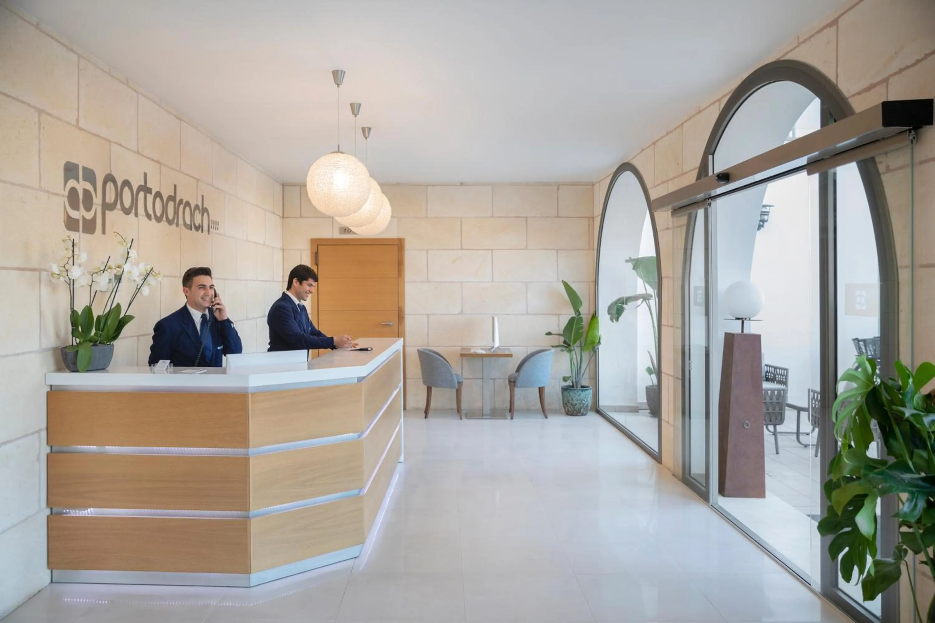 Lobby or reception in Porto Drach Aparthotel & Suites