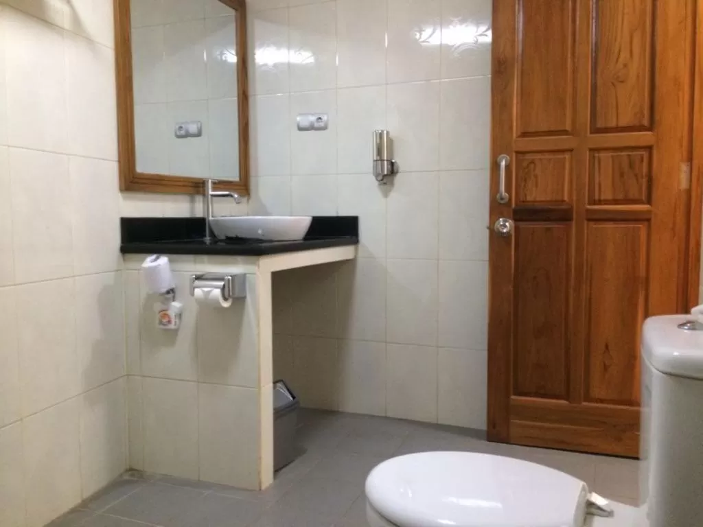 Bathroom in Astina Hotel