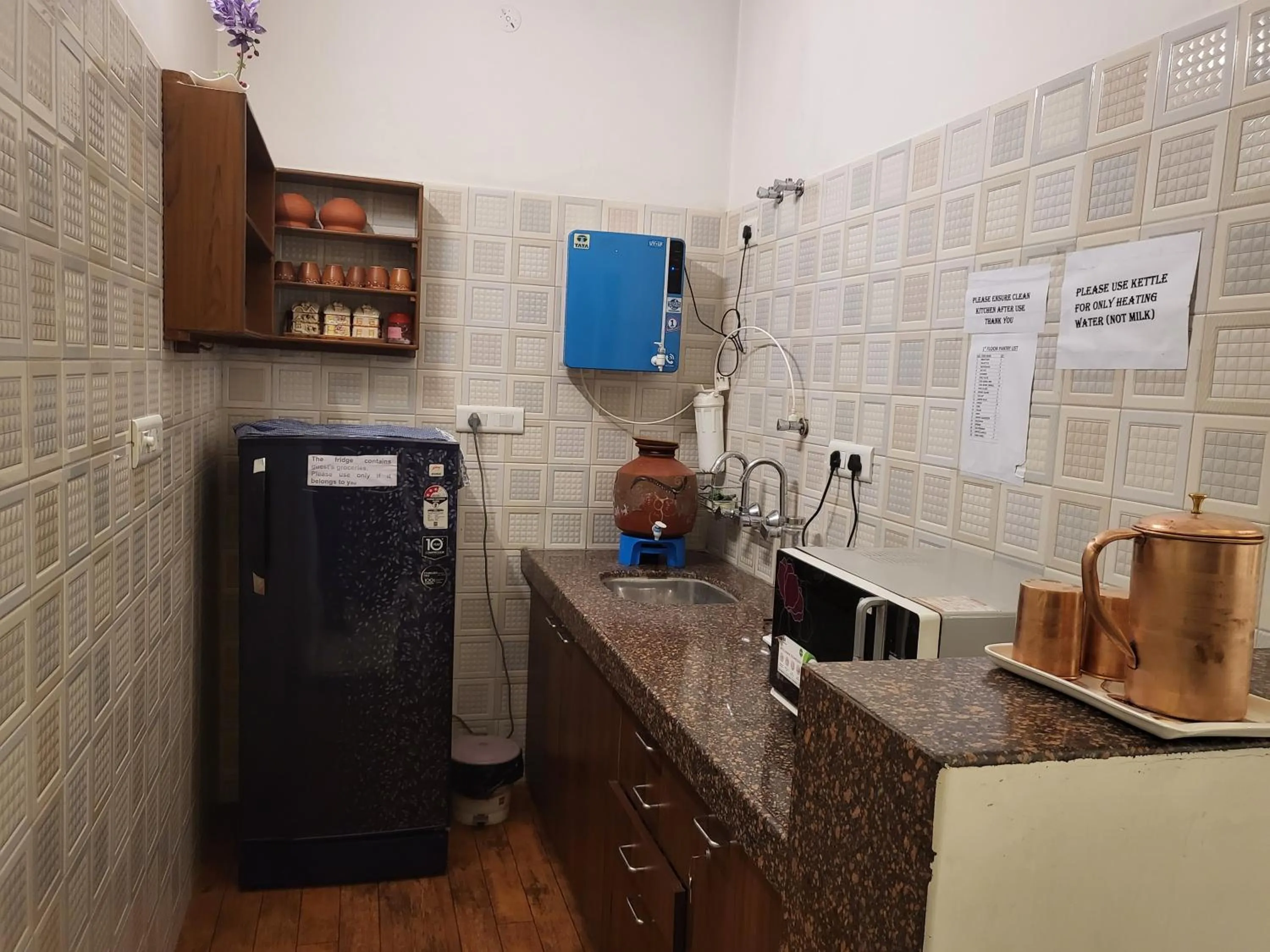 Kitchen or kitchenette in All Seasons Heritage Homestay