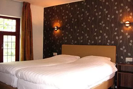 Bedroom, Bed in Herberg St. Brigida